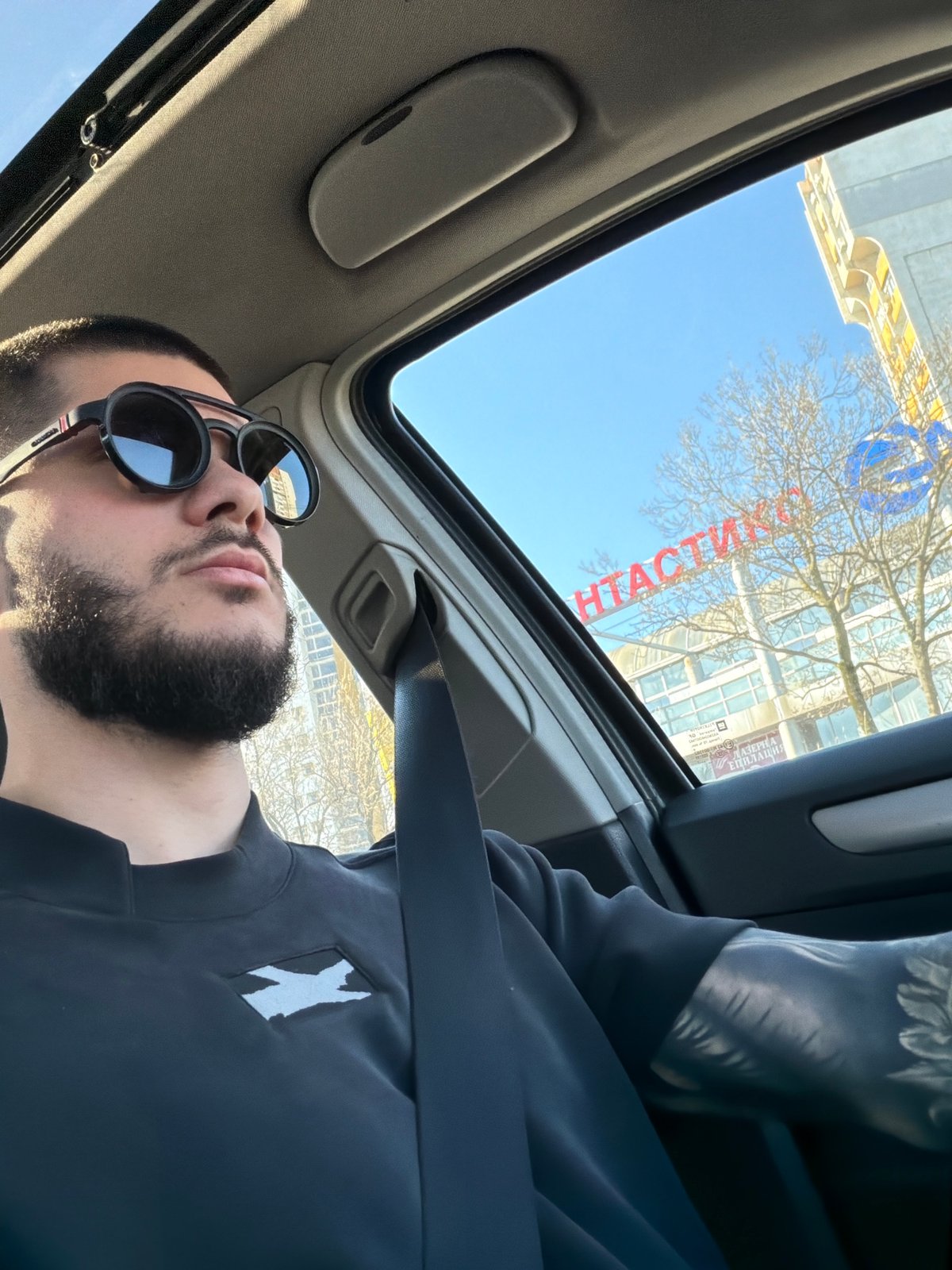 Morning drive through Sofia captured via open sunroof