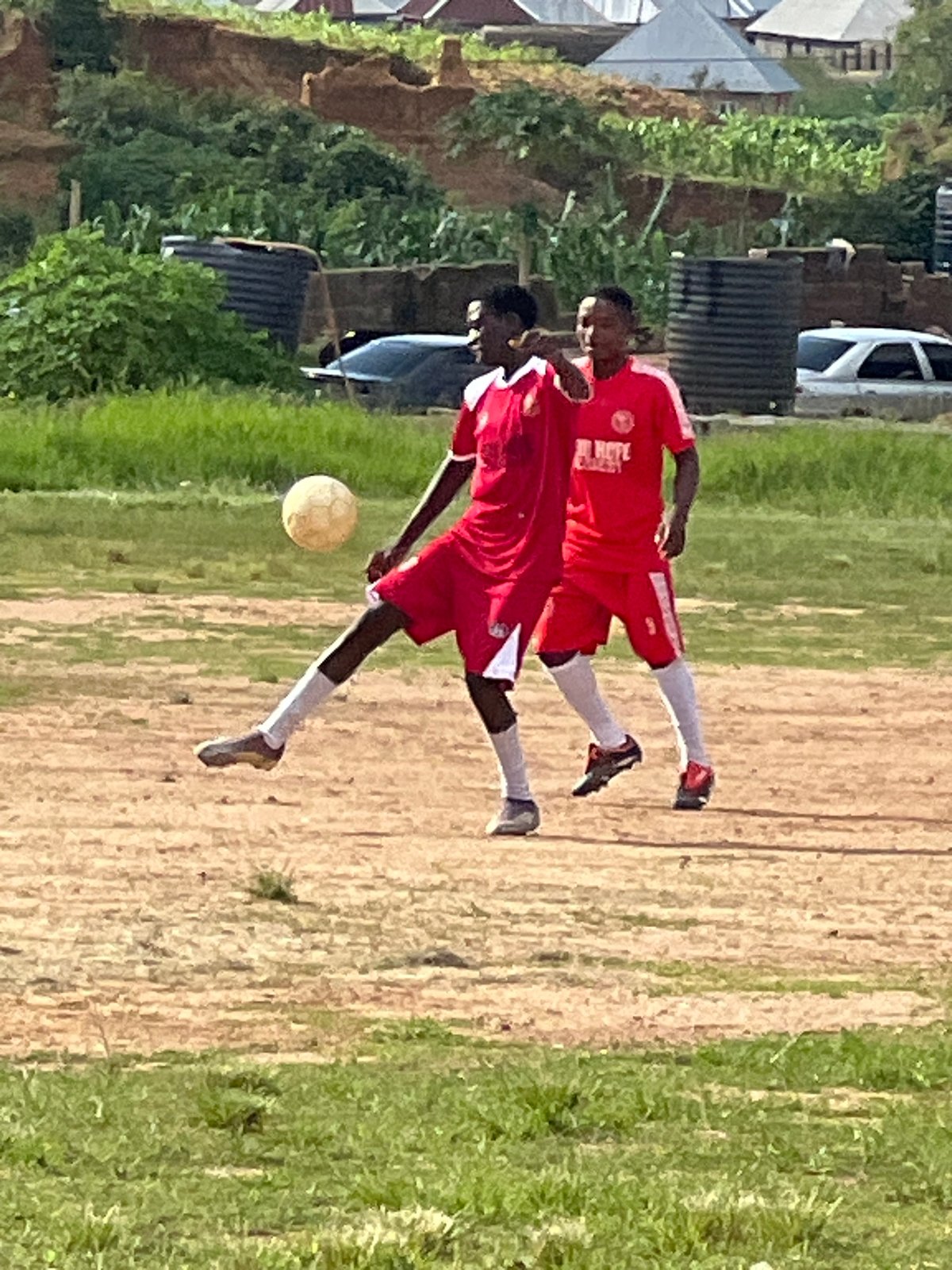 New Hope FC trains and scrimmages on a Jos dirt field