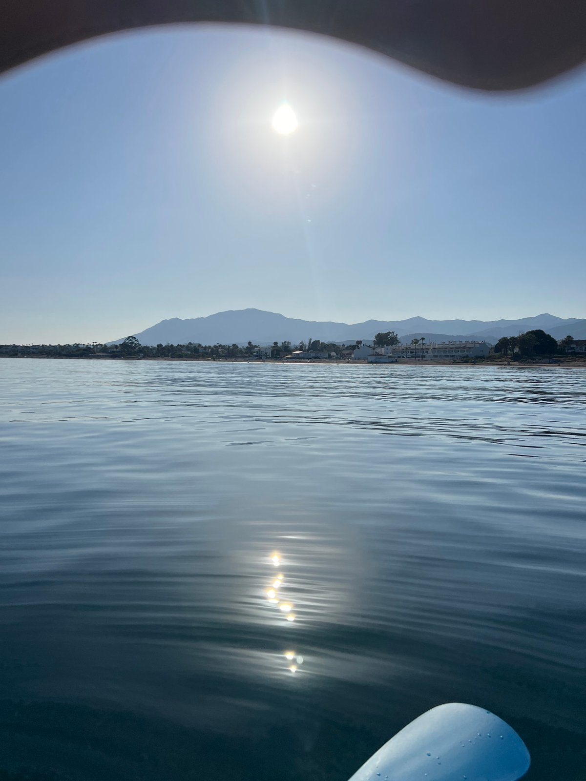 Paddleboarding on calm Mediterranean water near Estepona