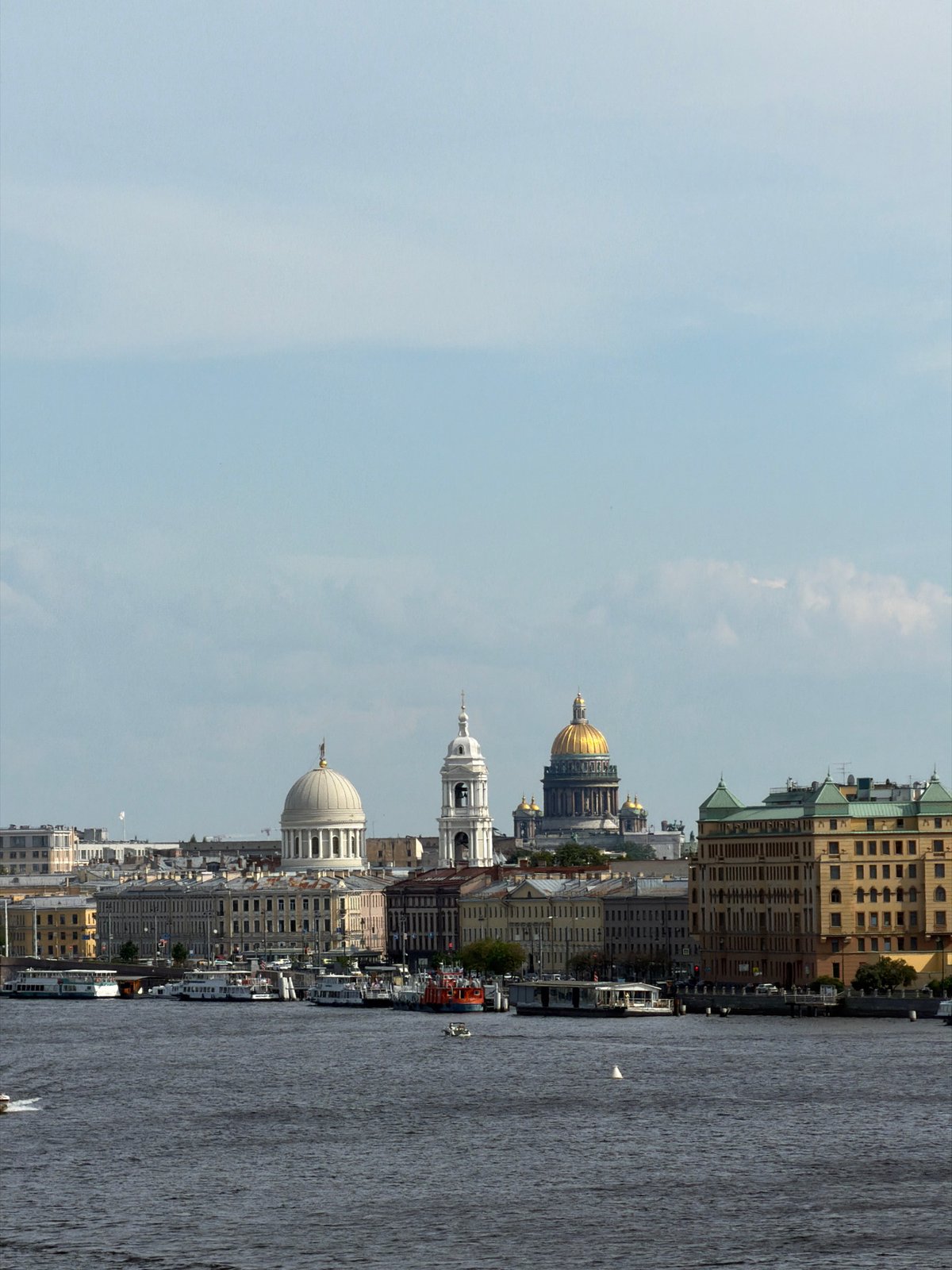 Recreational boats cruise Neva River in Saint Petersburg