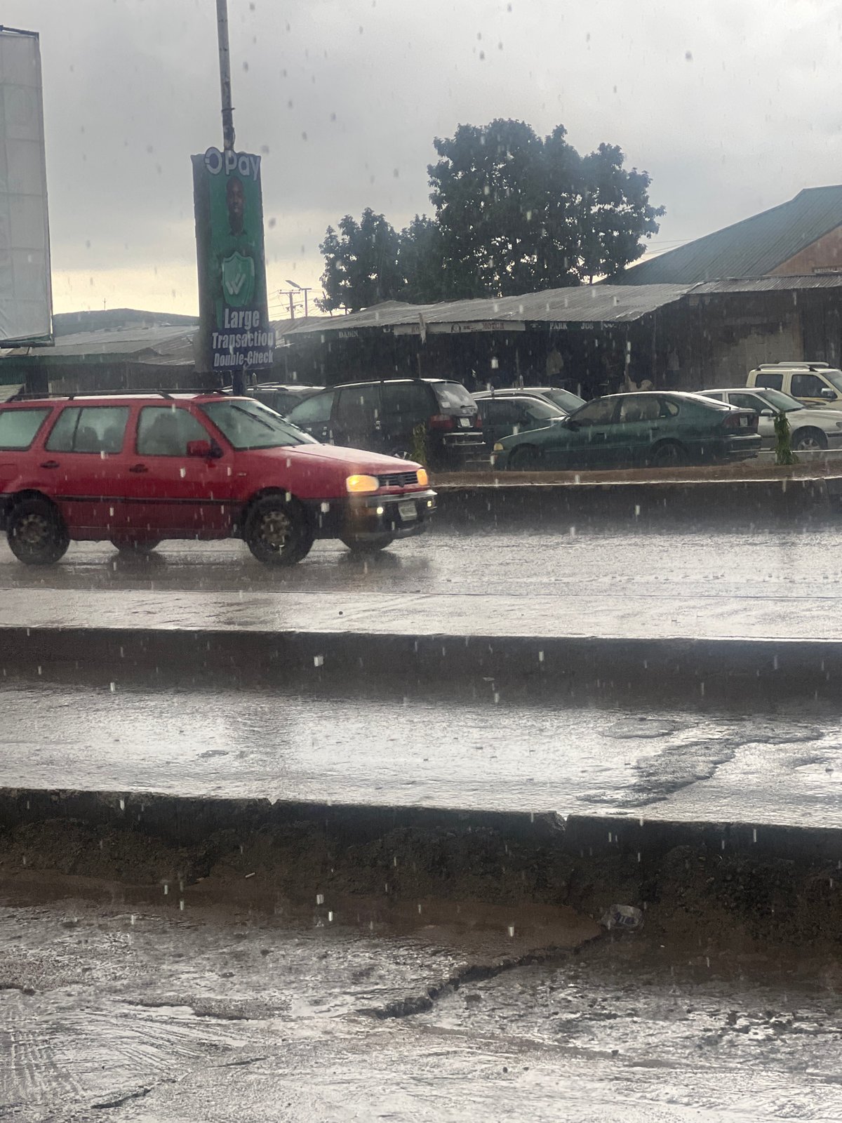 Rainy afternoon street life across Jos and Gura Top, Nigeria