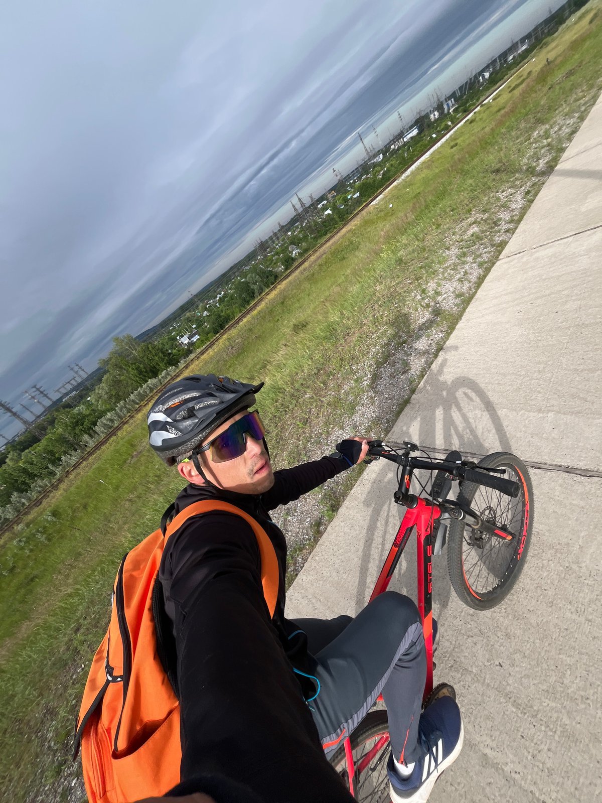 Early morning cyclist takes selfies on Chaikovsky path