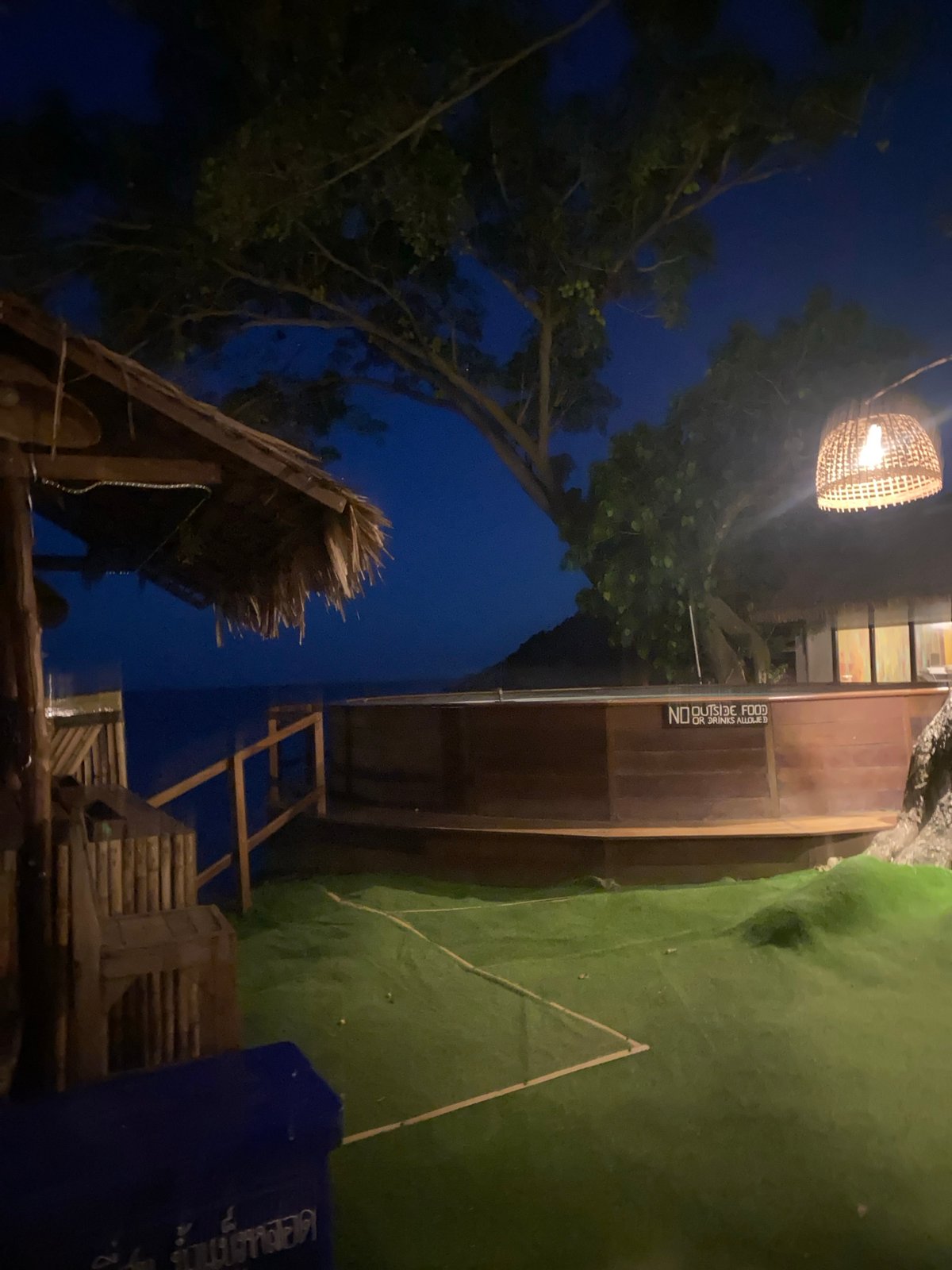 Nighttime scenes captured at outdoor venue in Ban Tai, Thailand