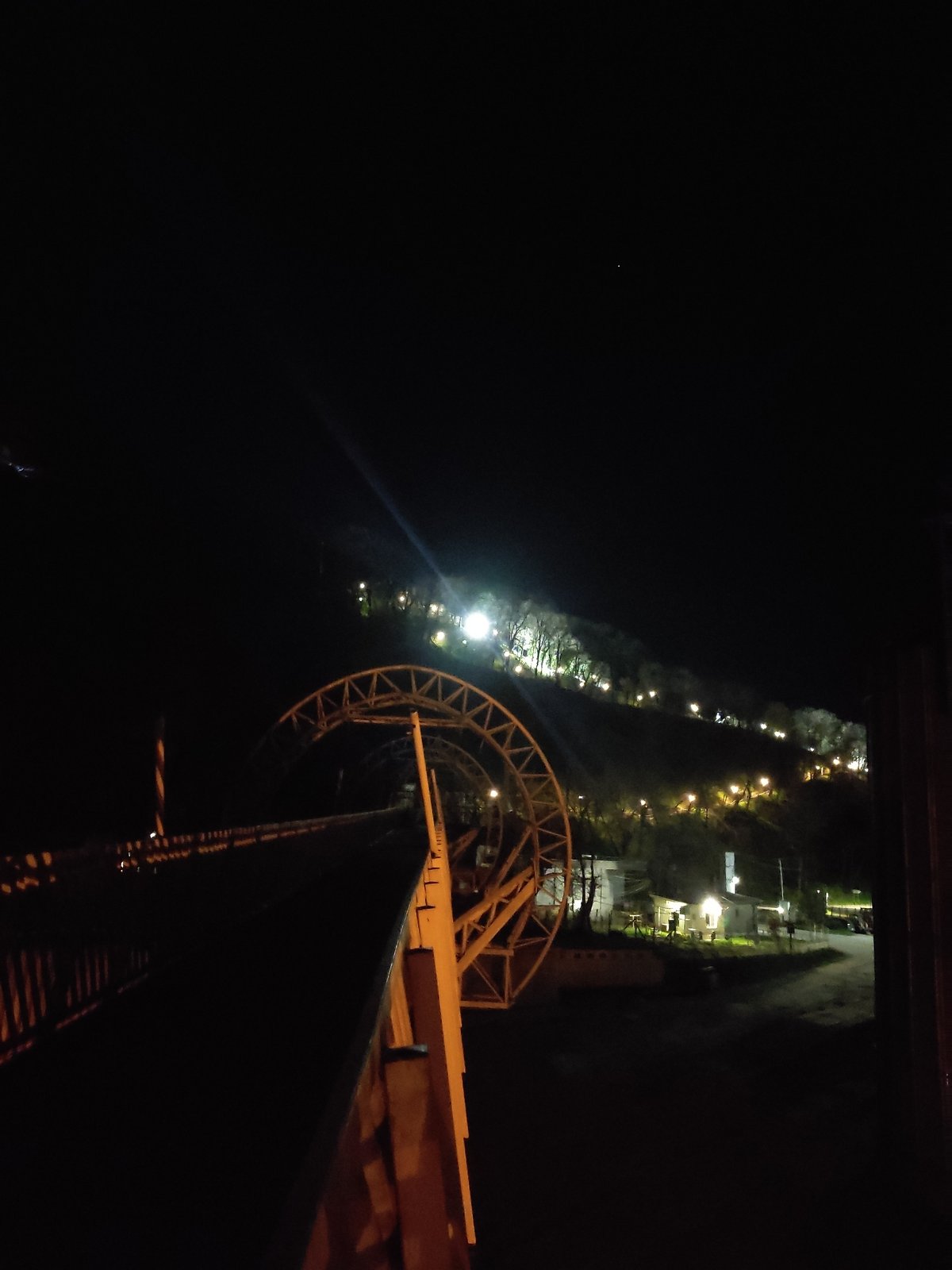 Illuminated canyon viewed from elevated vantage point at night