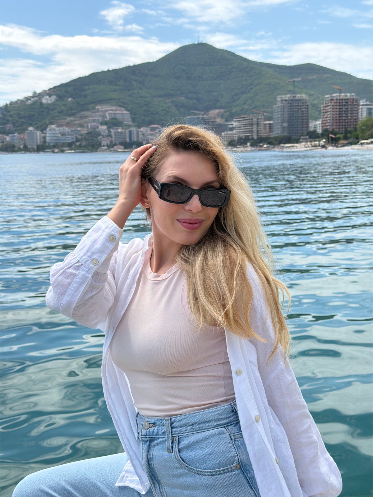 Tourist photoshoot captured along Budva's Adriatic coastline