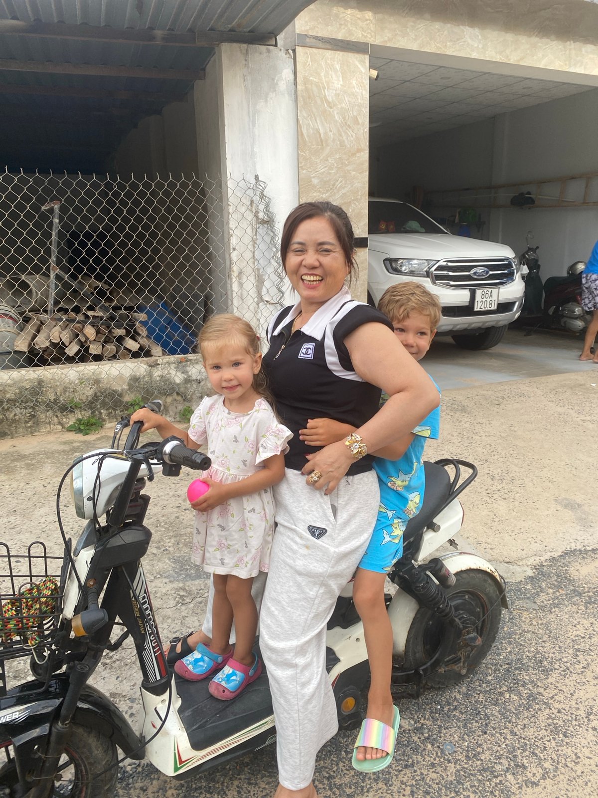 Family moment with an electric scooter in Mũi Né