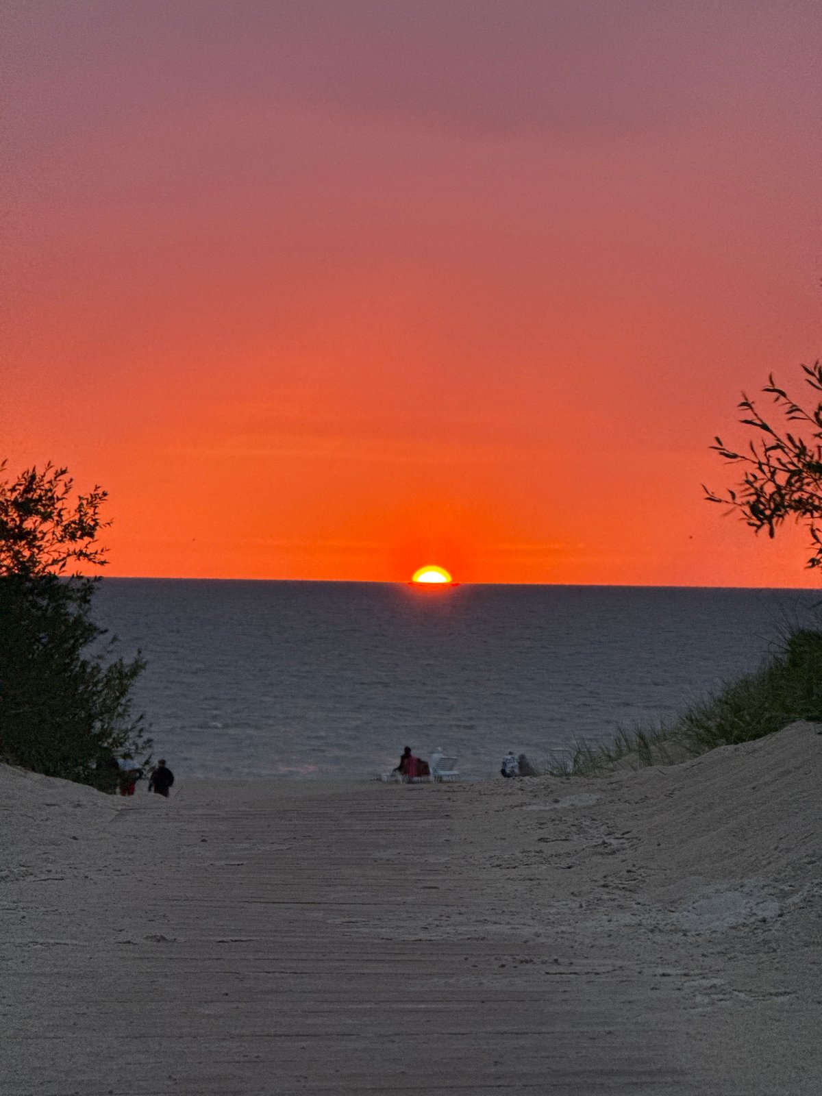 Summer evening camping and scootering along the Baltic coast