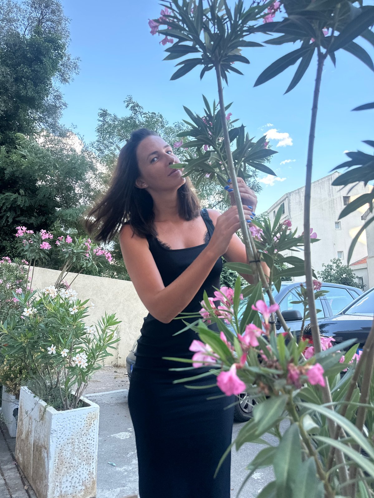 Afternoon portraits in a flowering outdoor spot in Budva