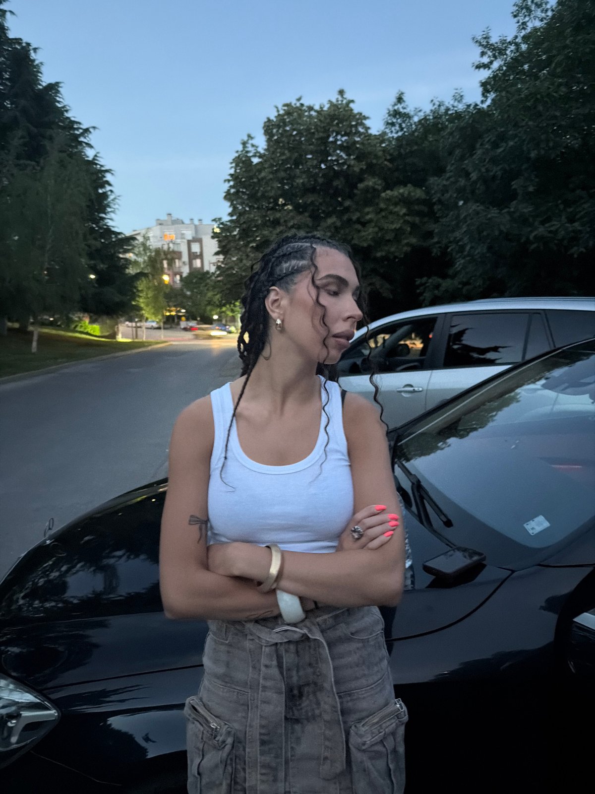 Evening hangout by parked cars in Blagoevgrad, Bulgaria