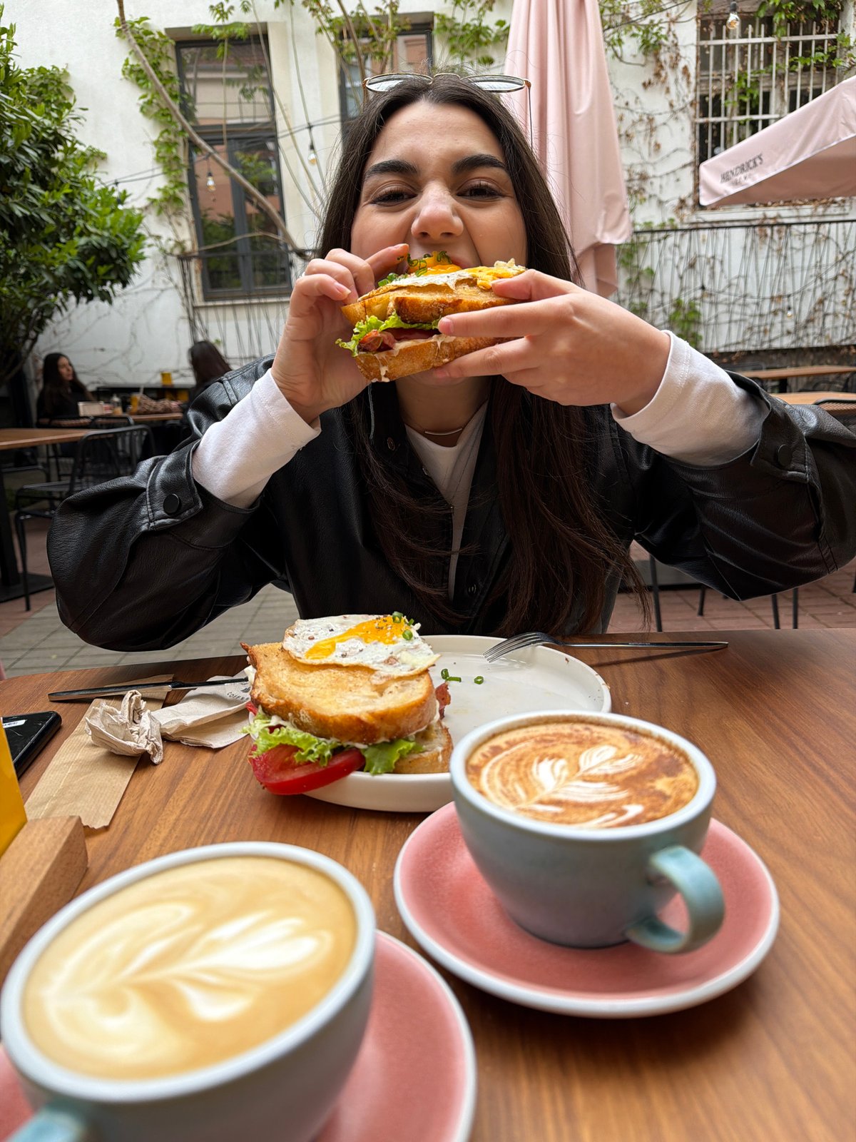 Woman enjoys coffee and shopping during afternoon outing in Sofia
