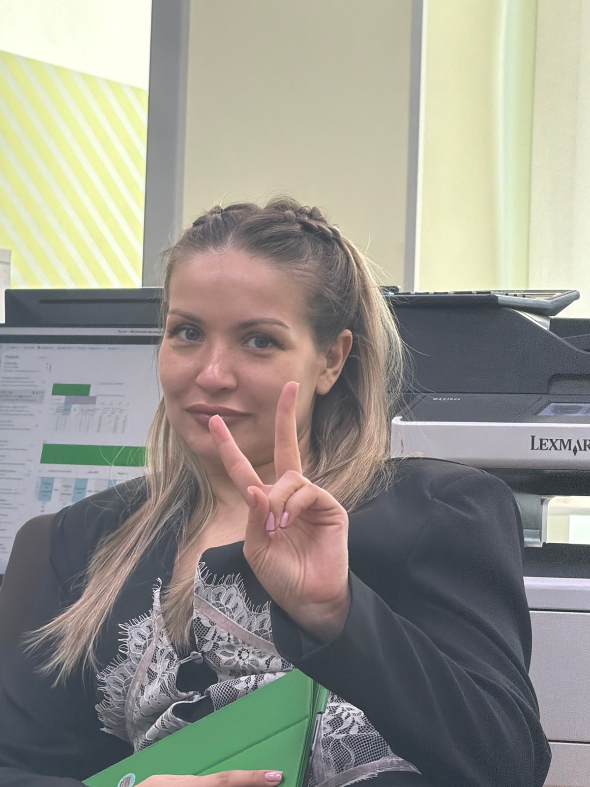 Late-night office work session captured in Krasnoyarsk business district