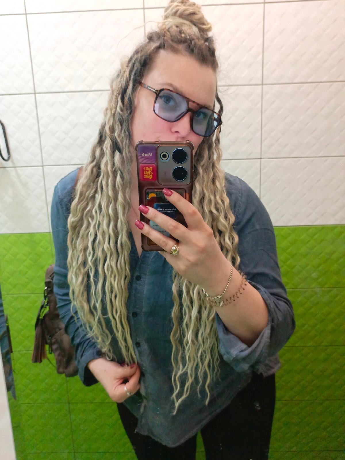 Woman takes bathroom selfies in decorated Russian home