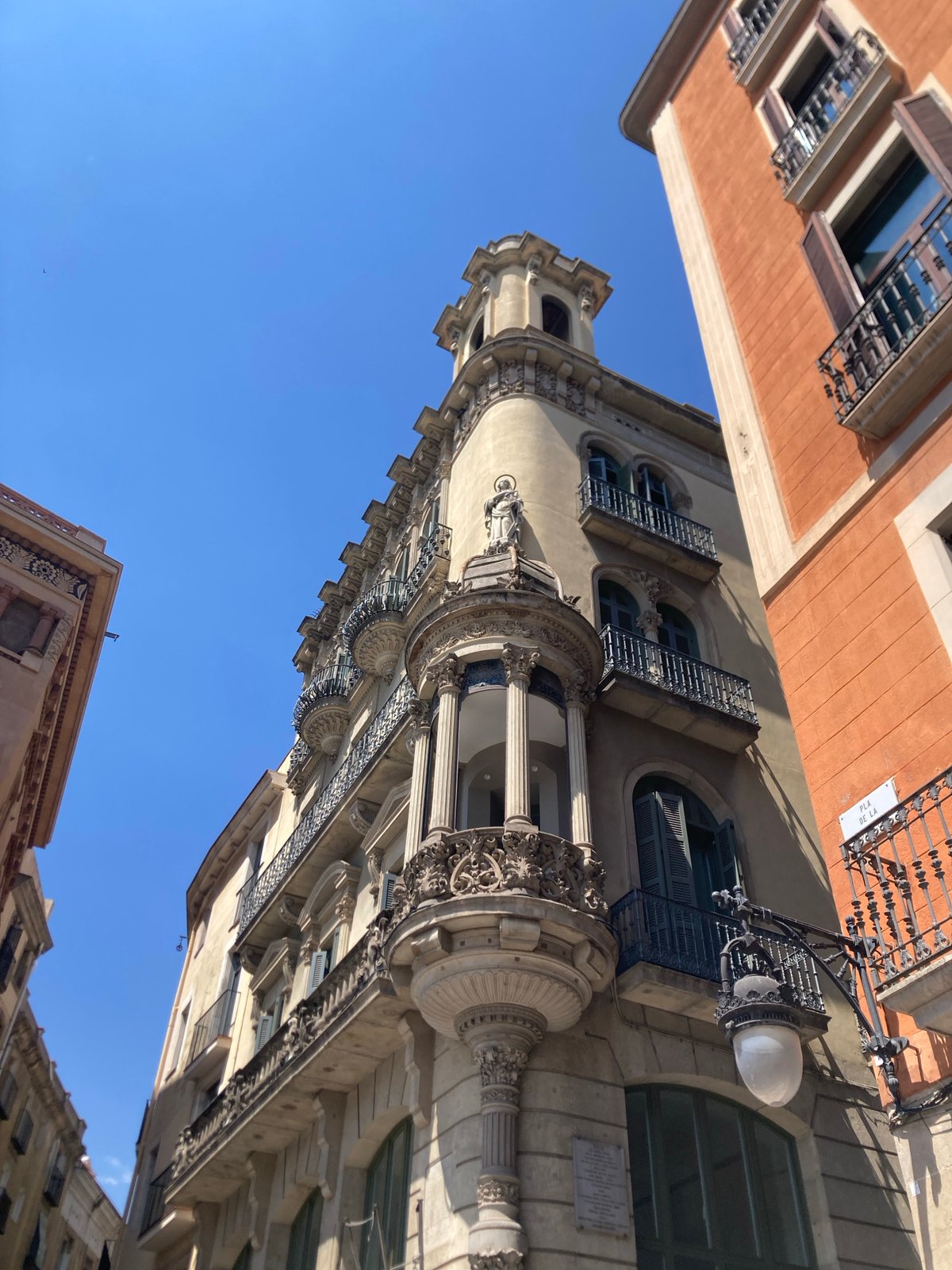 Barcelona street life: ornate facades, construction, and street art