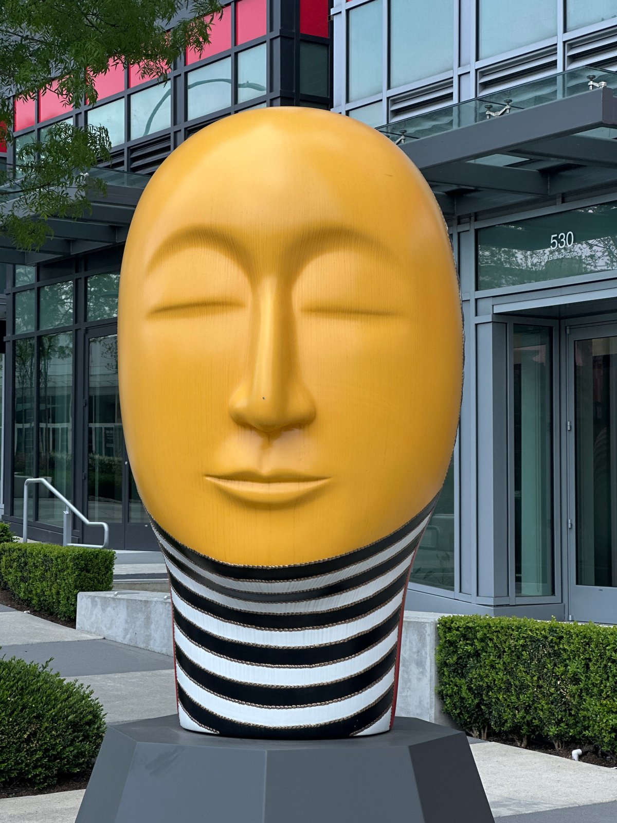 Large Yellow Head Sculptures Spotted in Burnaby Streets