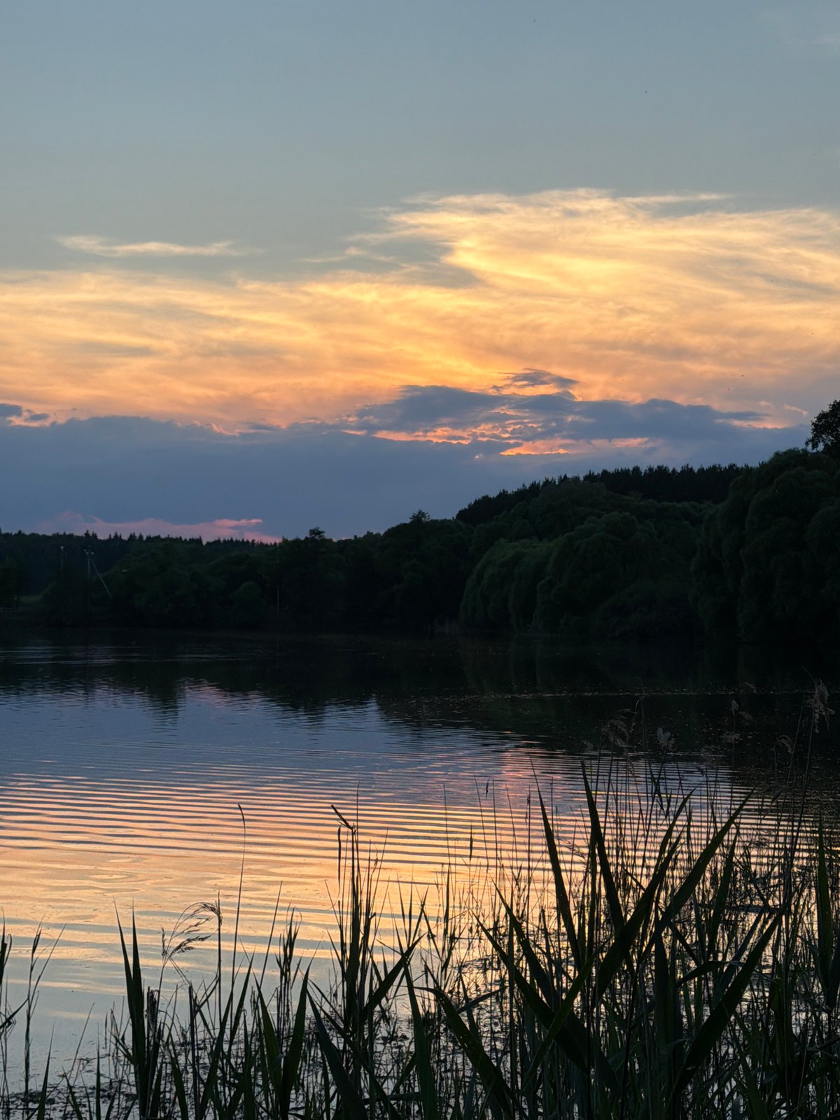 Evening documented at Russian village lake and Orthodox church