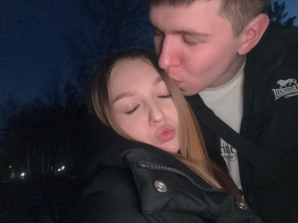 Intimate moment and frozen river sunset captured in Chaikovsky