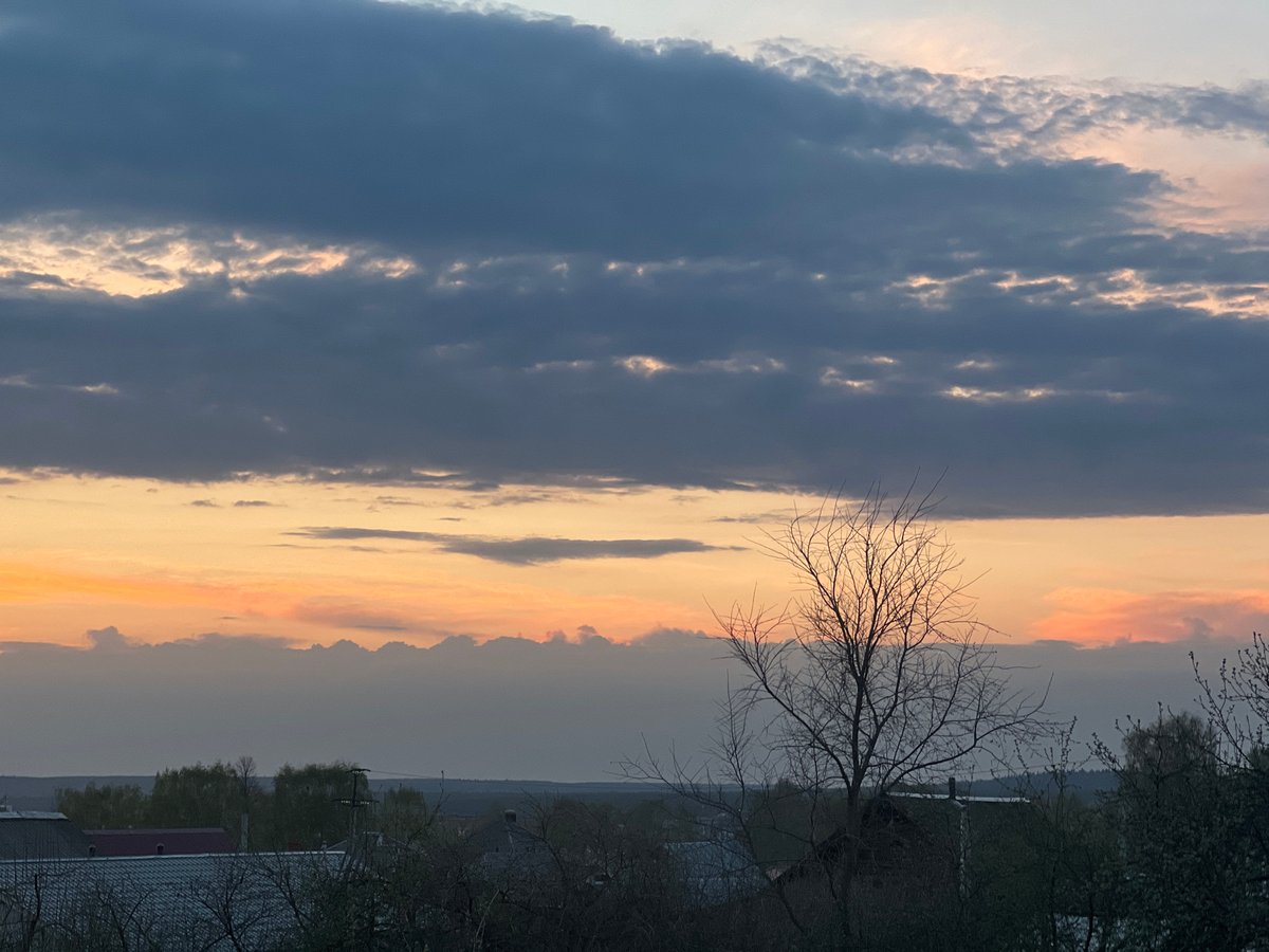 Dramatic sunset captured over Votkinsk, Russia with layered clouds