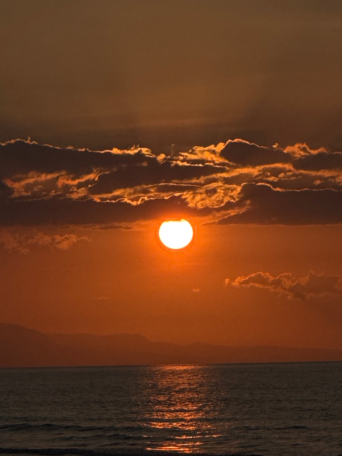 Sunset and fishing boats along the Meunasah Jurong coast