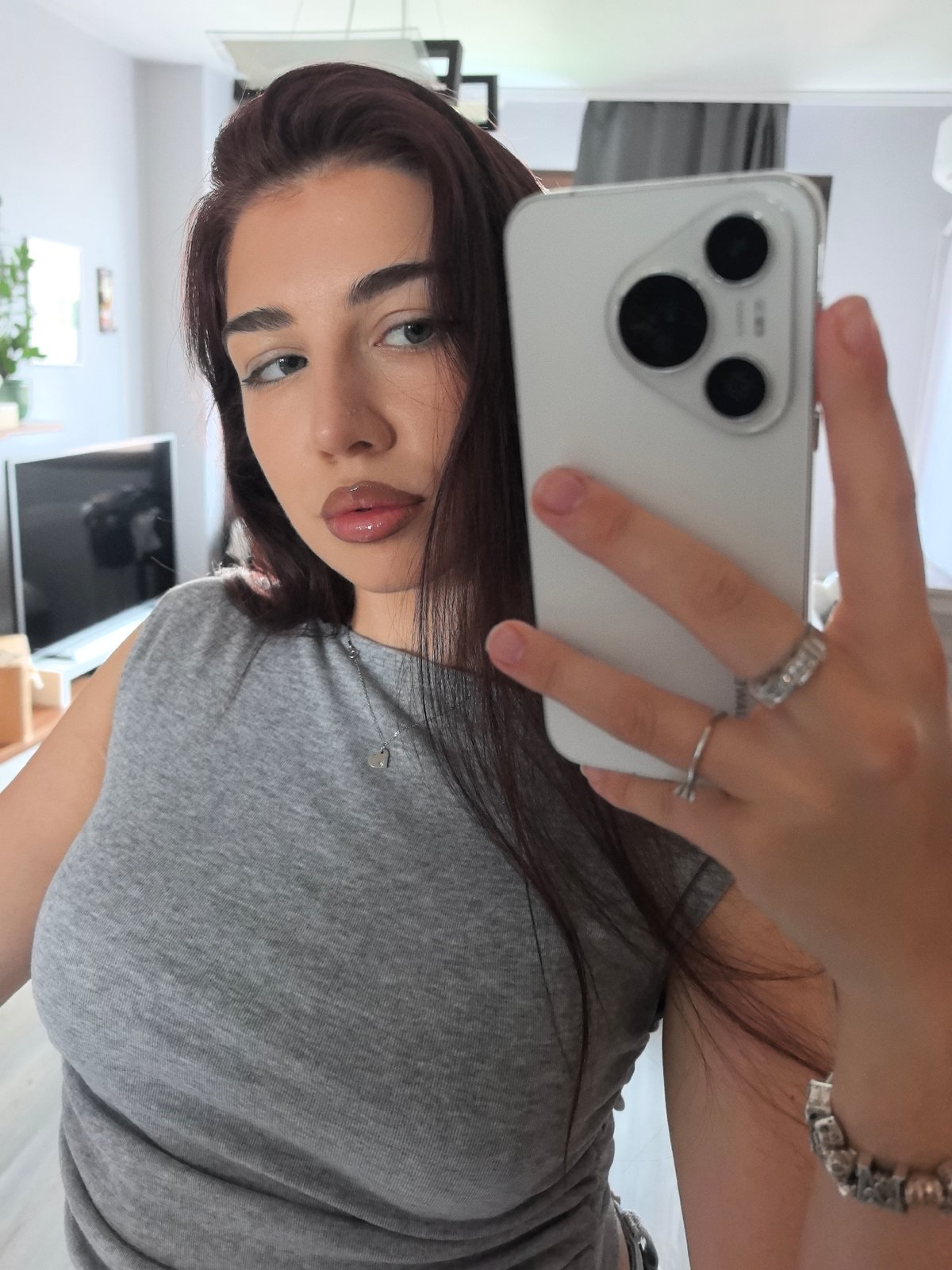 Woman takes morning selfies in Stara Zagora apartment
