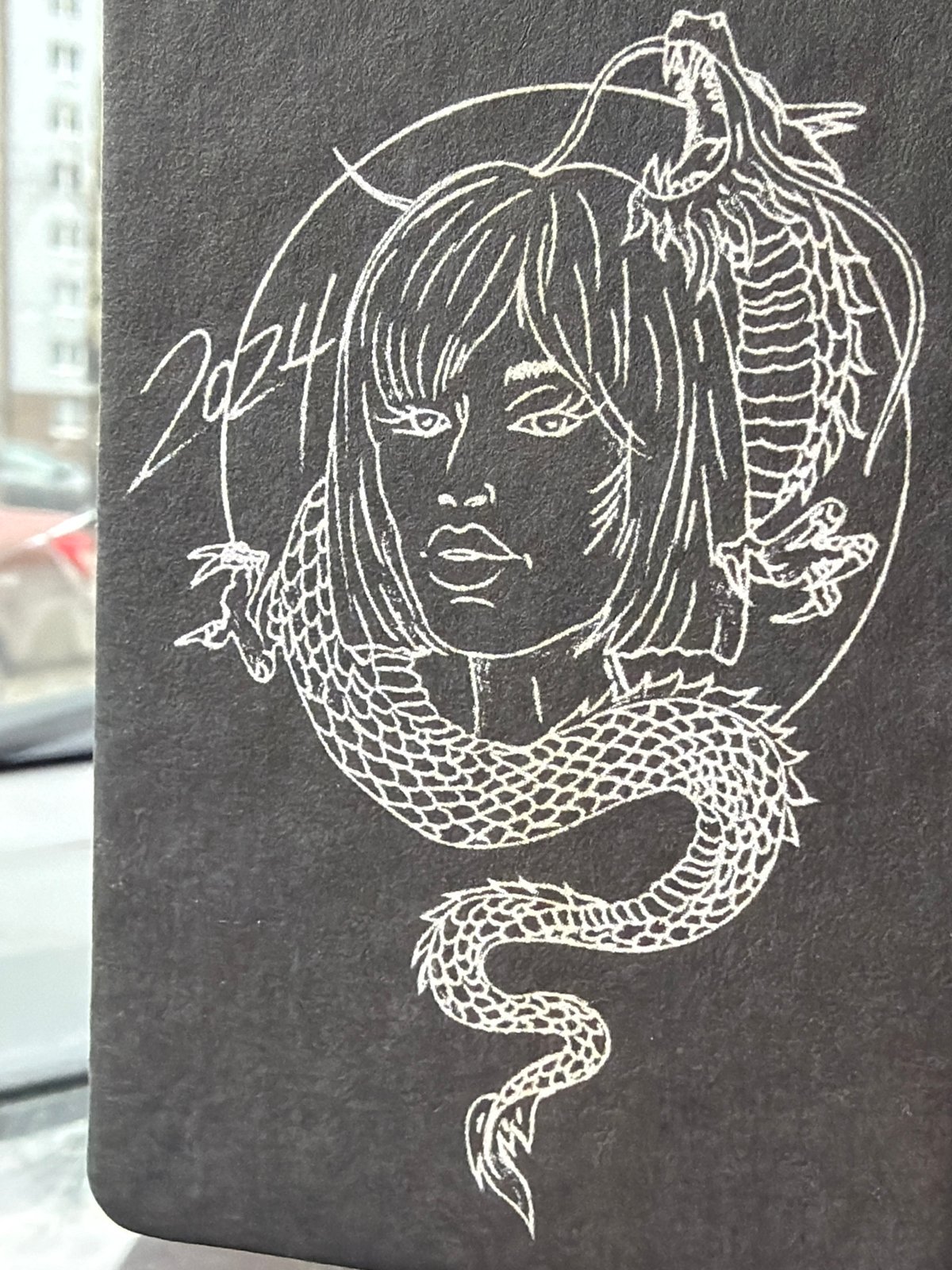 Dragon artwork and muddy truck documented in Izhevsk