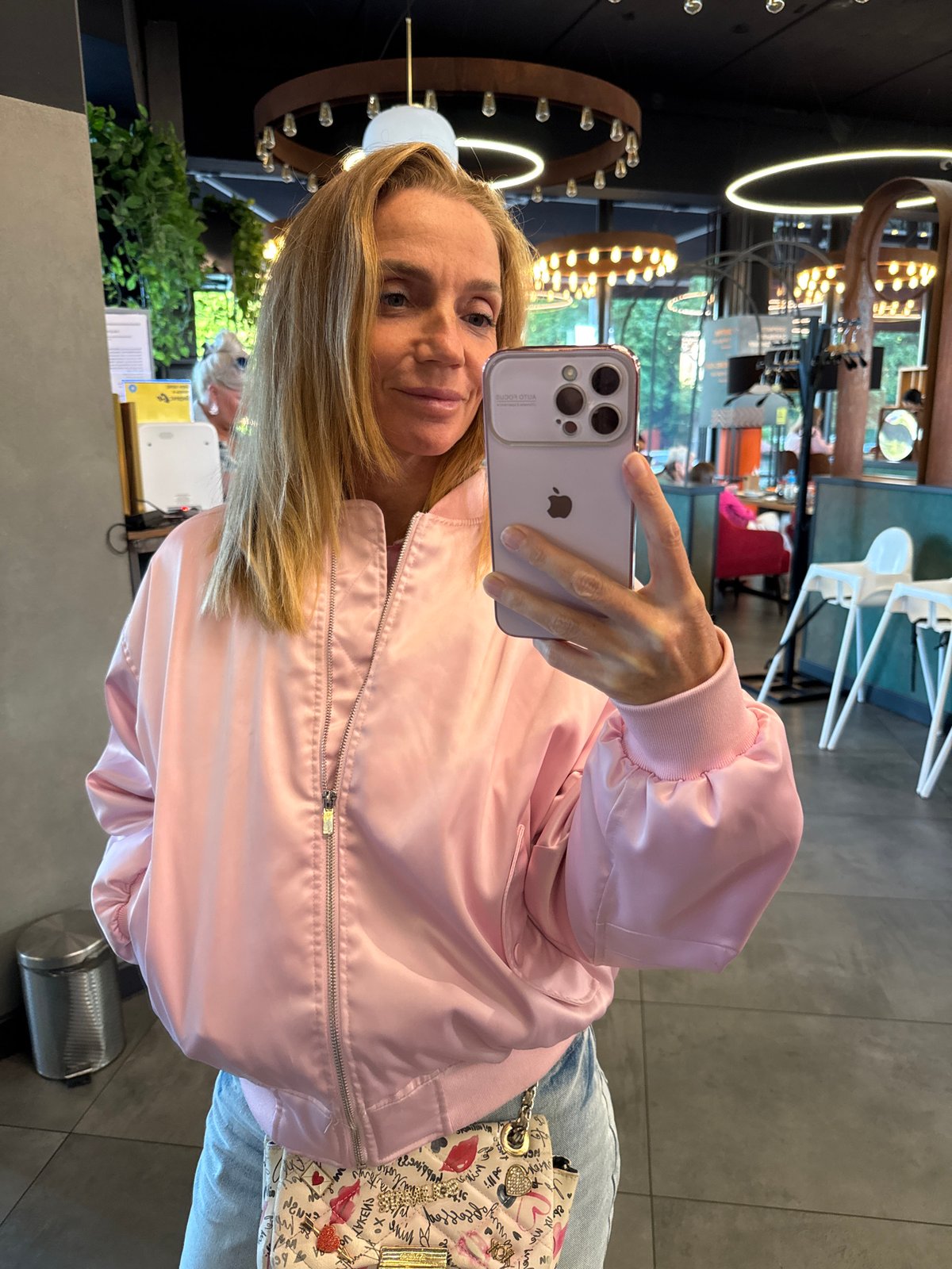 Woman documents cafe visit with selfies and sushi in Veliky Novgorod