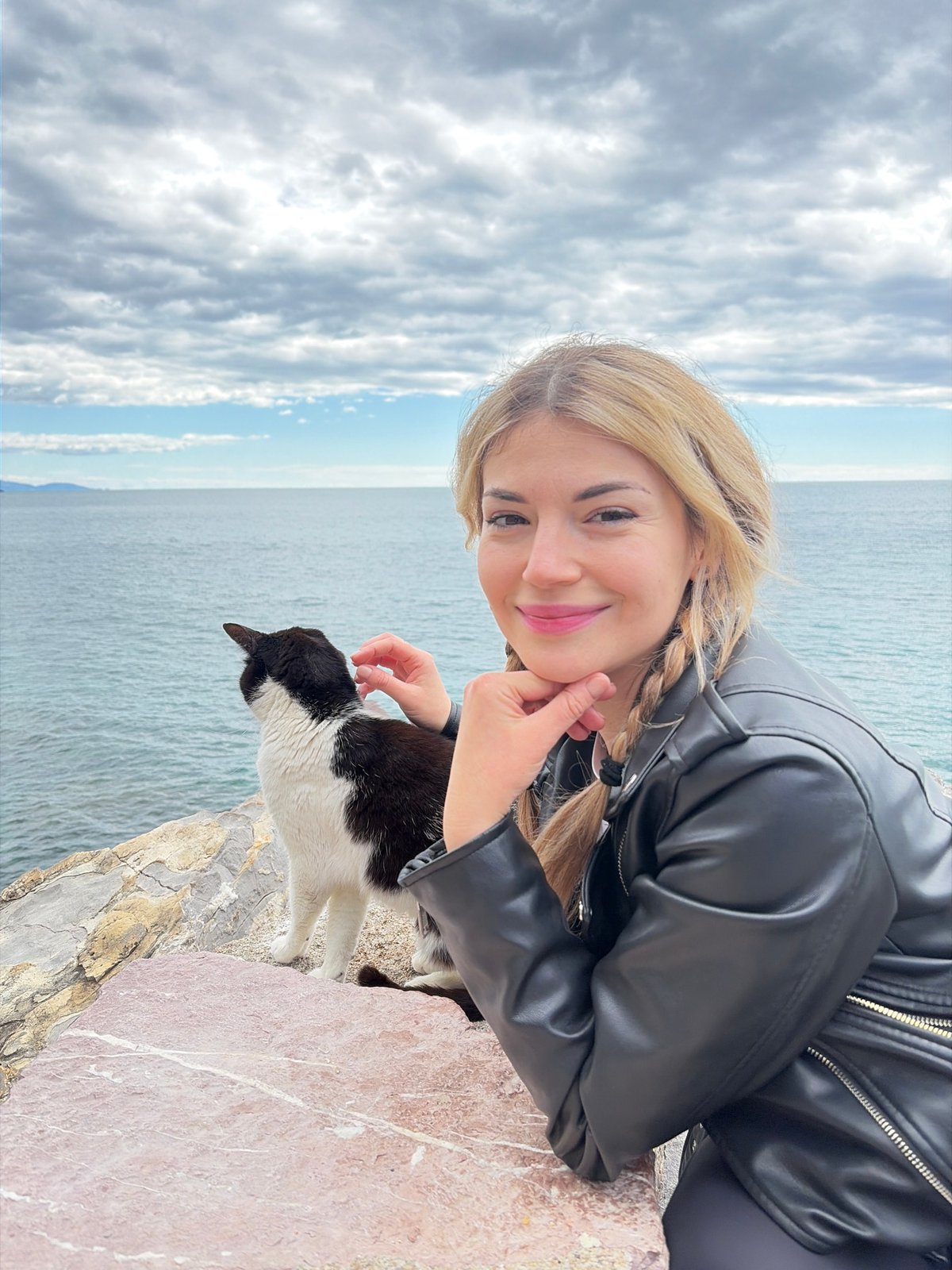 Woman poses for coastal photo session in Budva Montenegro