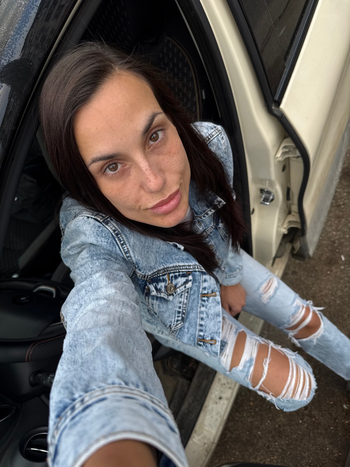 Woman in denim photographed at multiple Pleven locations