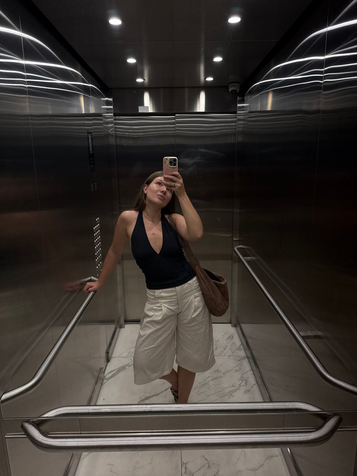 Elevator mirror selfie, Belgrade — halter top and pinstripe culottes