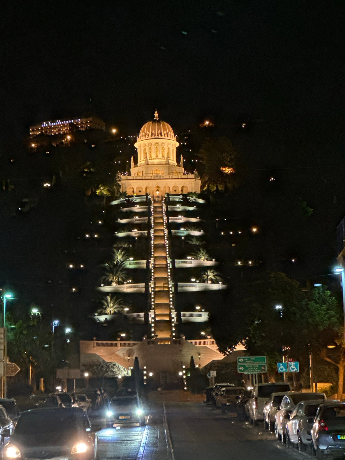 Evening scenes around Haifa — lights, landmarks, and a dinner stop