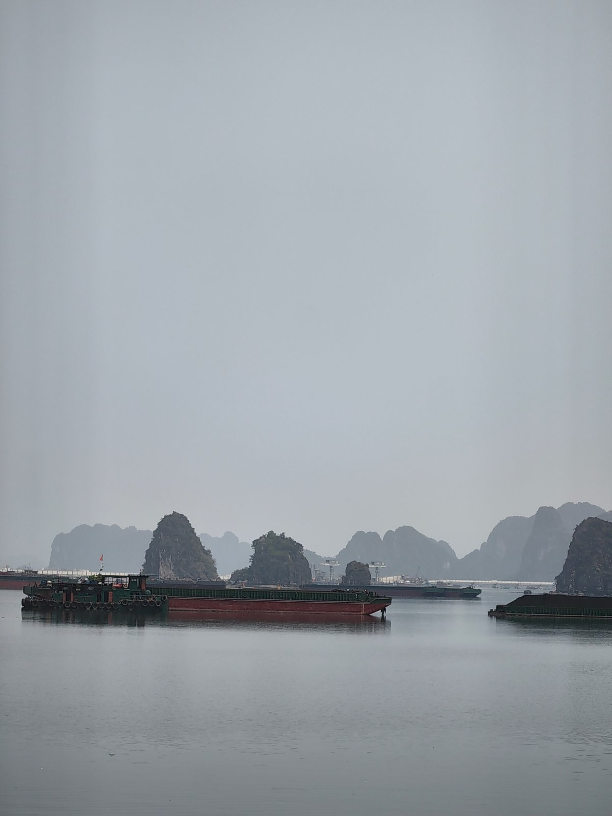 Morning view of Ha Long Bay karsts witnessed from Quang Hanh