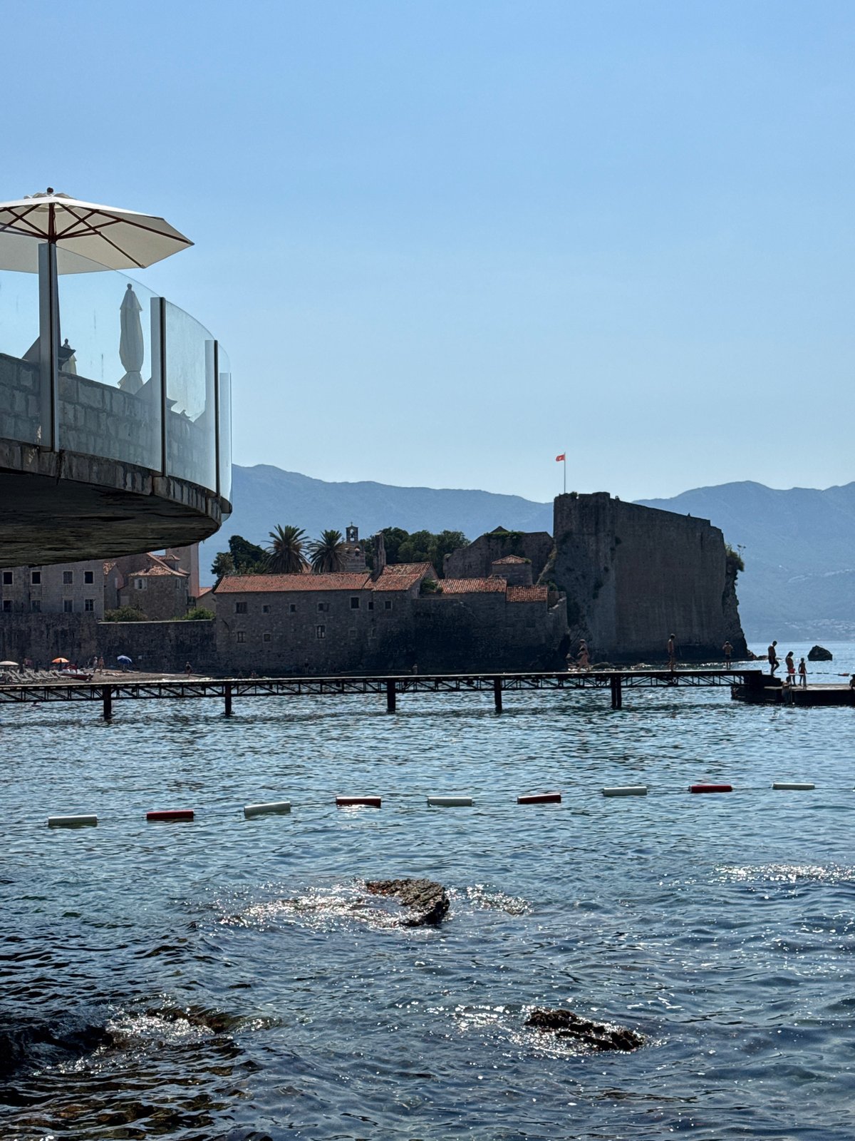 Sunny morning around Budva's coast and old town streets