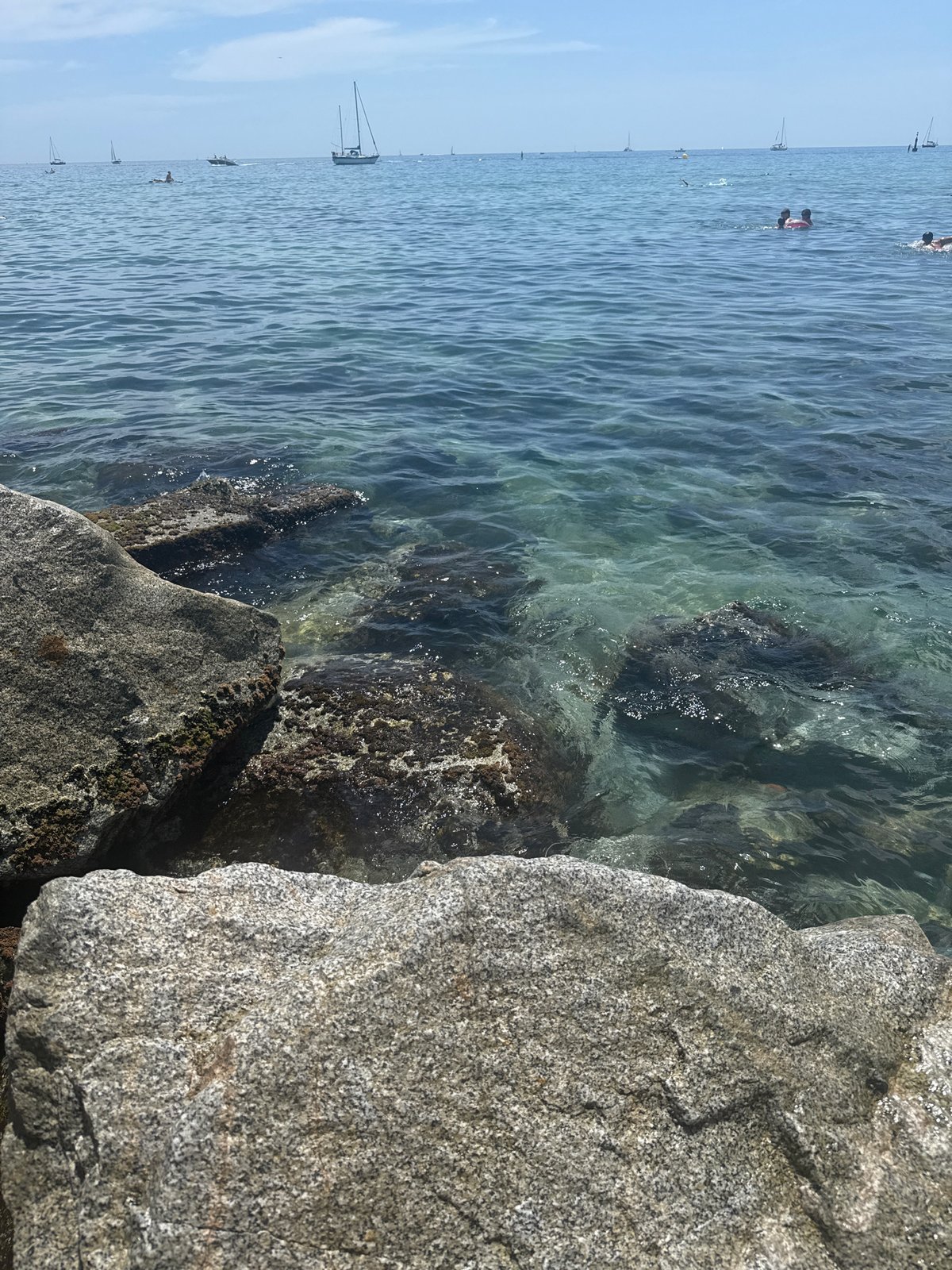 Summer beach day in Badalona with coastal dining and water activities
