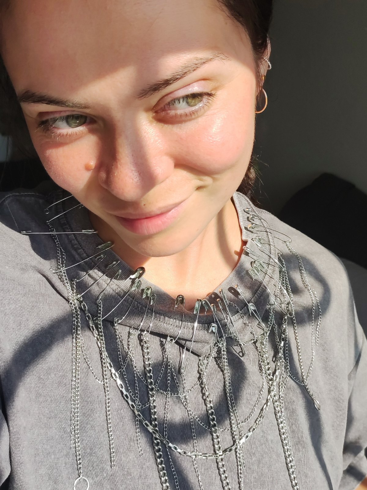 Close-up portrait in Chaikovsky, natural light, green eyes