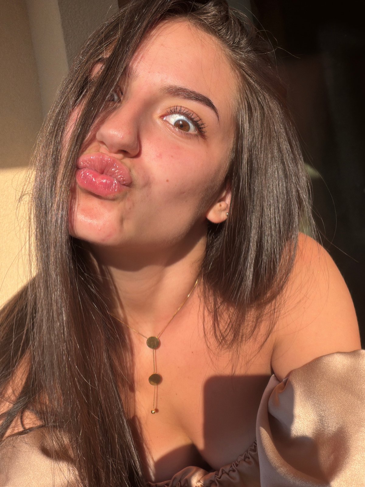 Sunlit selfie series in Burgas, satin top and dark hair