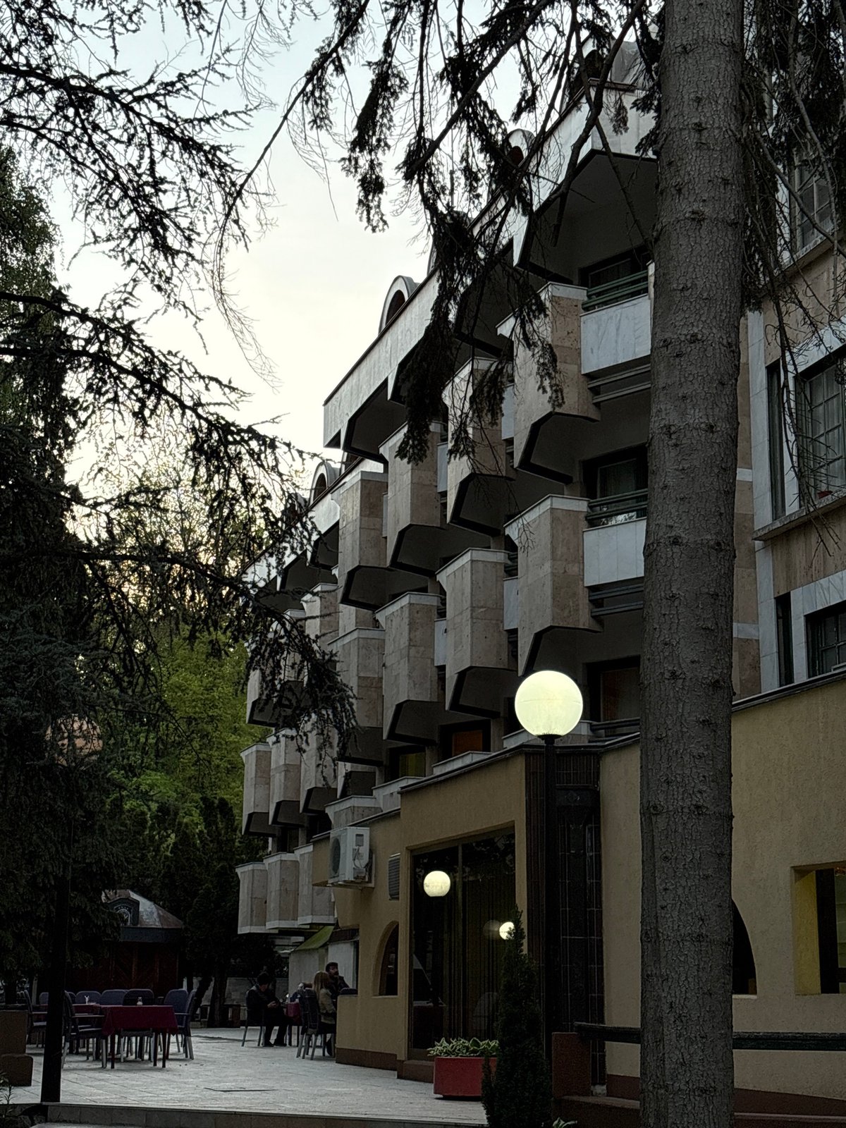 Rotated street photo captured in Serbian spa town