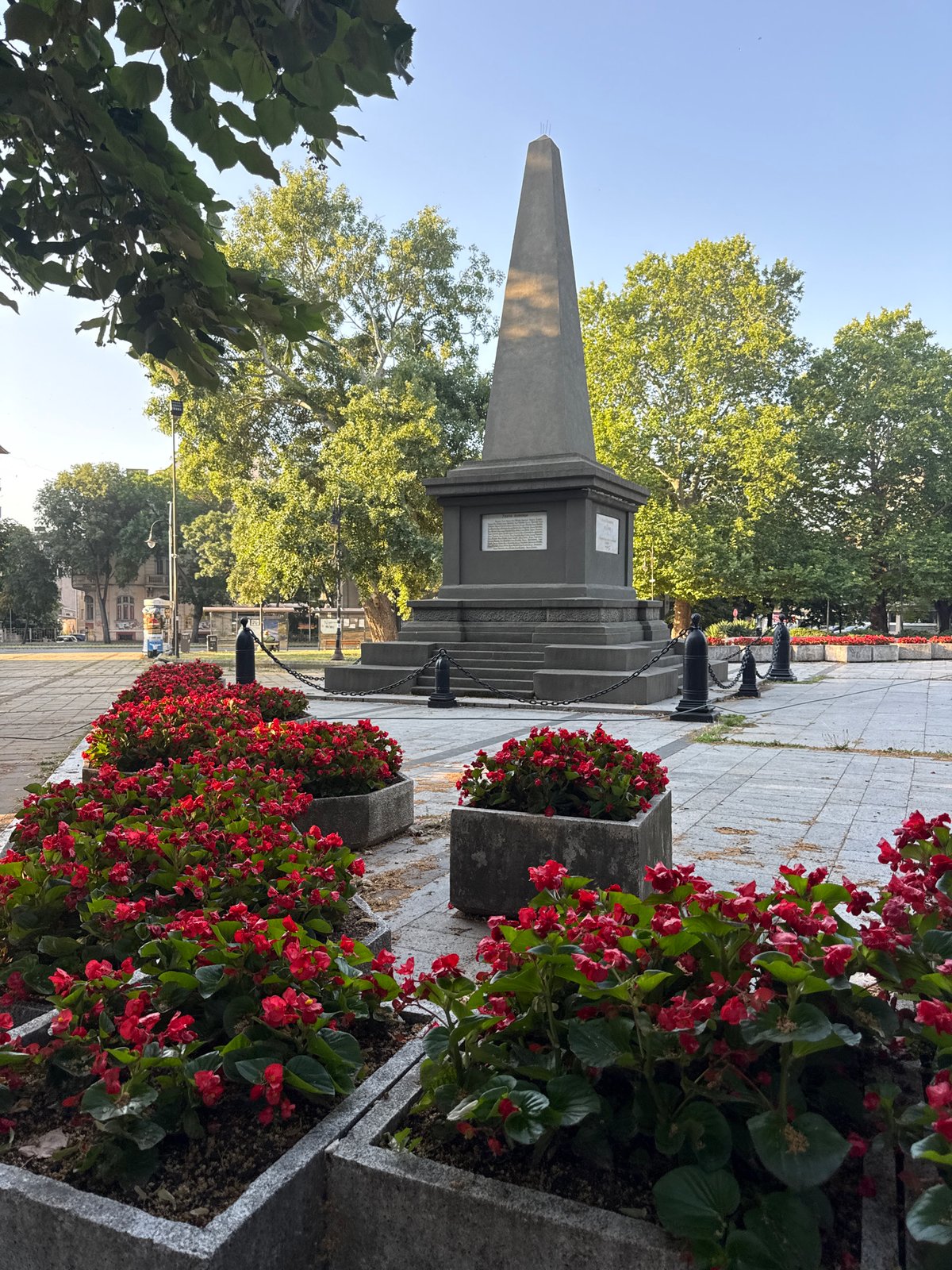 Morning light across Varna's central plaza and revival monument