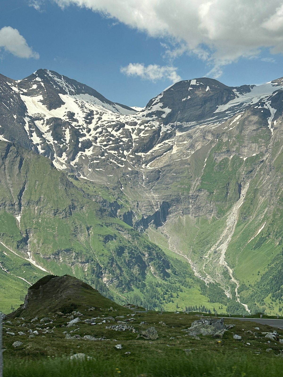 Cycling and sightseeing along the Großglockner on a summer morning