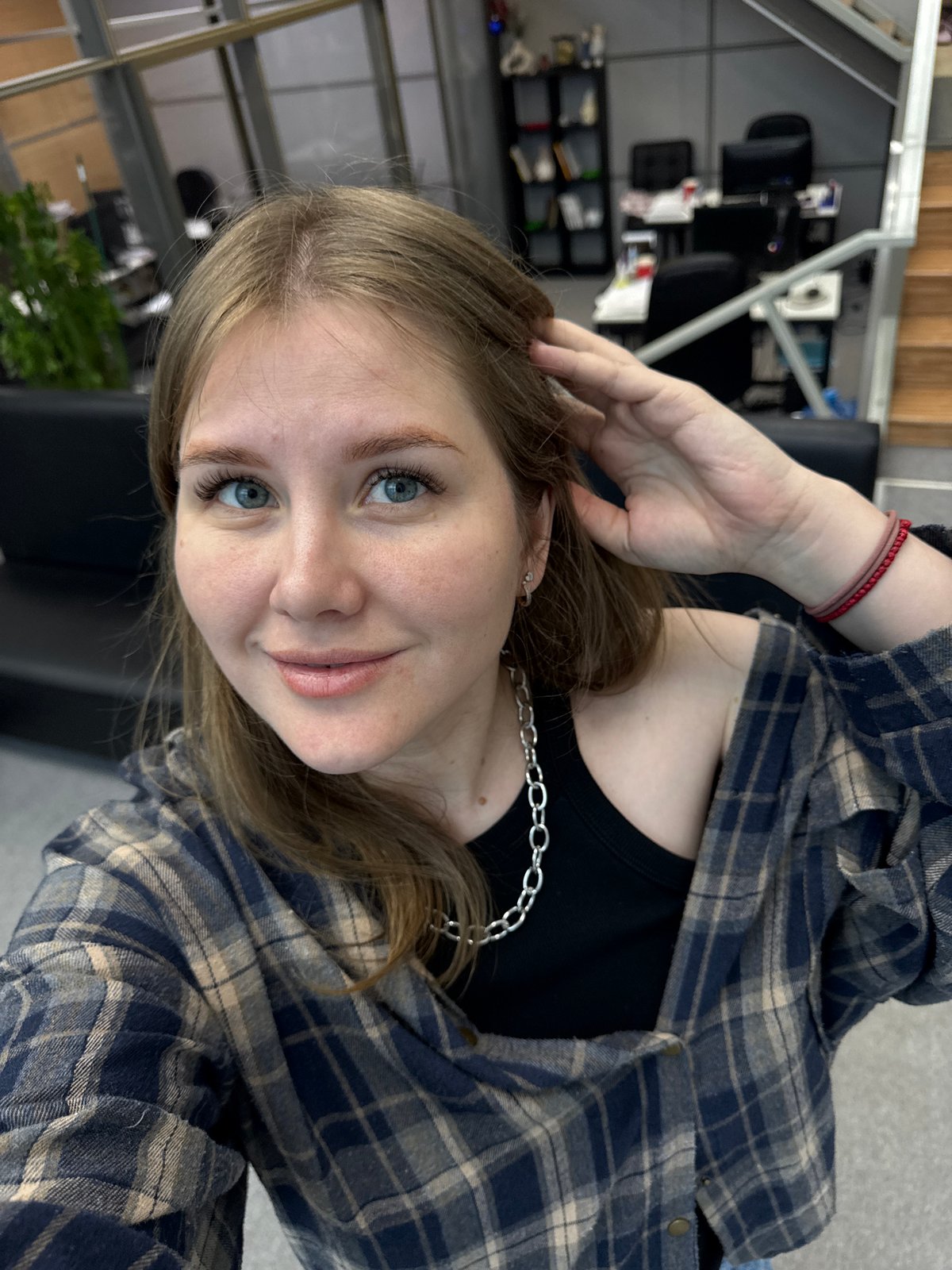 Young woman documents casual day through selfies in Perm