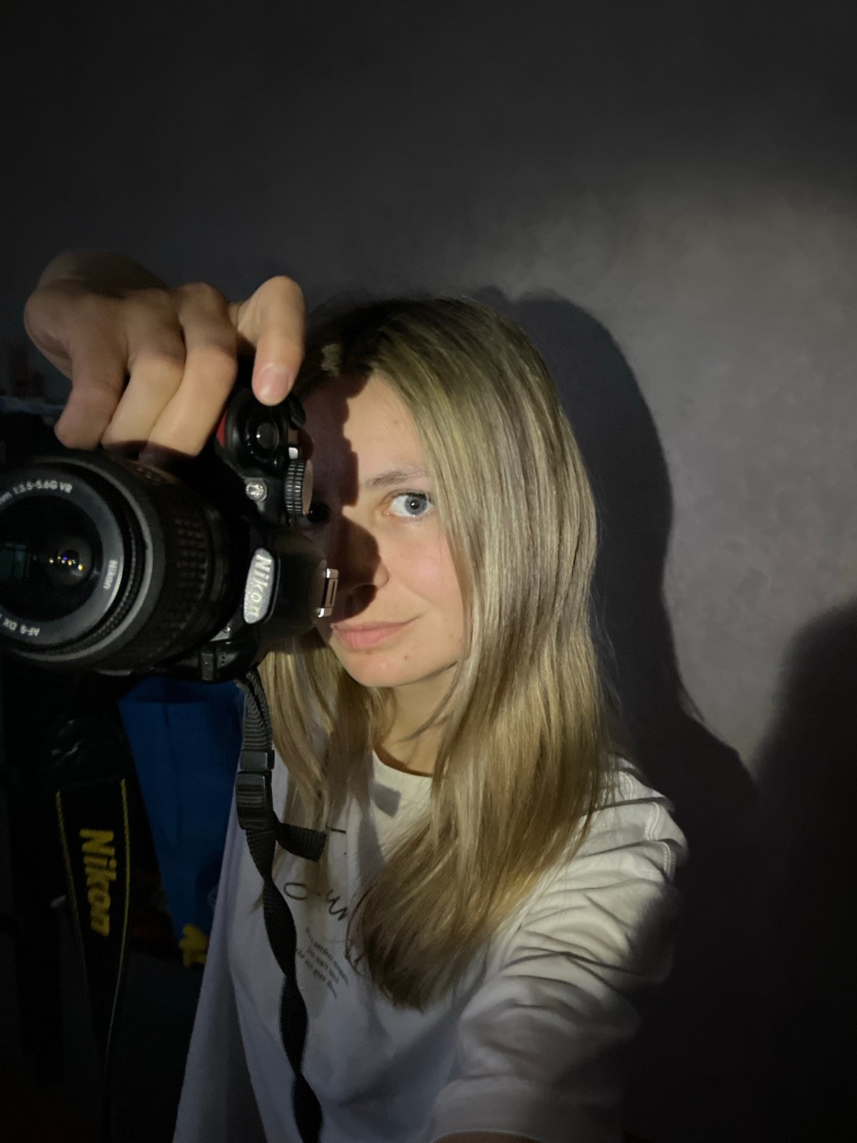 Photographer and cat documented in separate Chaikovsky scenes