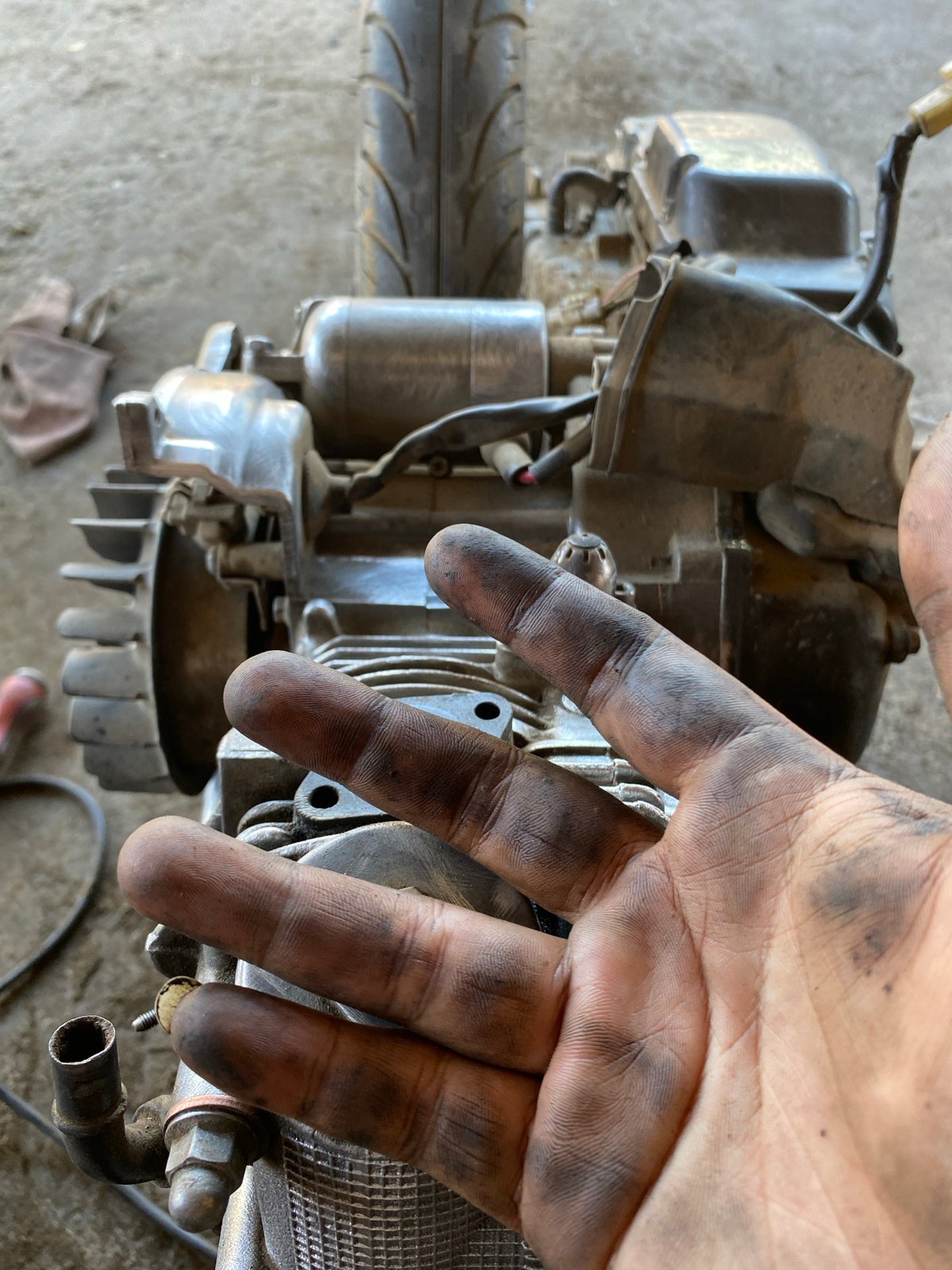 Motorcycle engine teardown and cleaning in Bayu, Indonesia