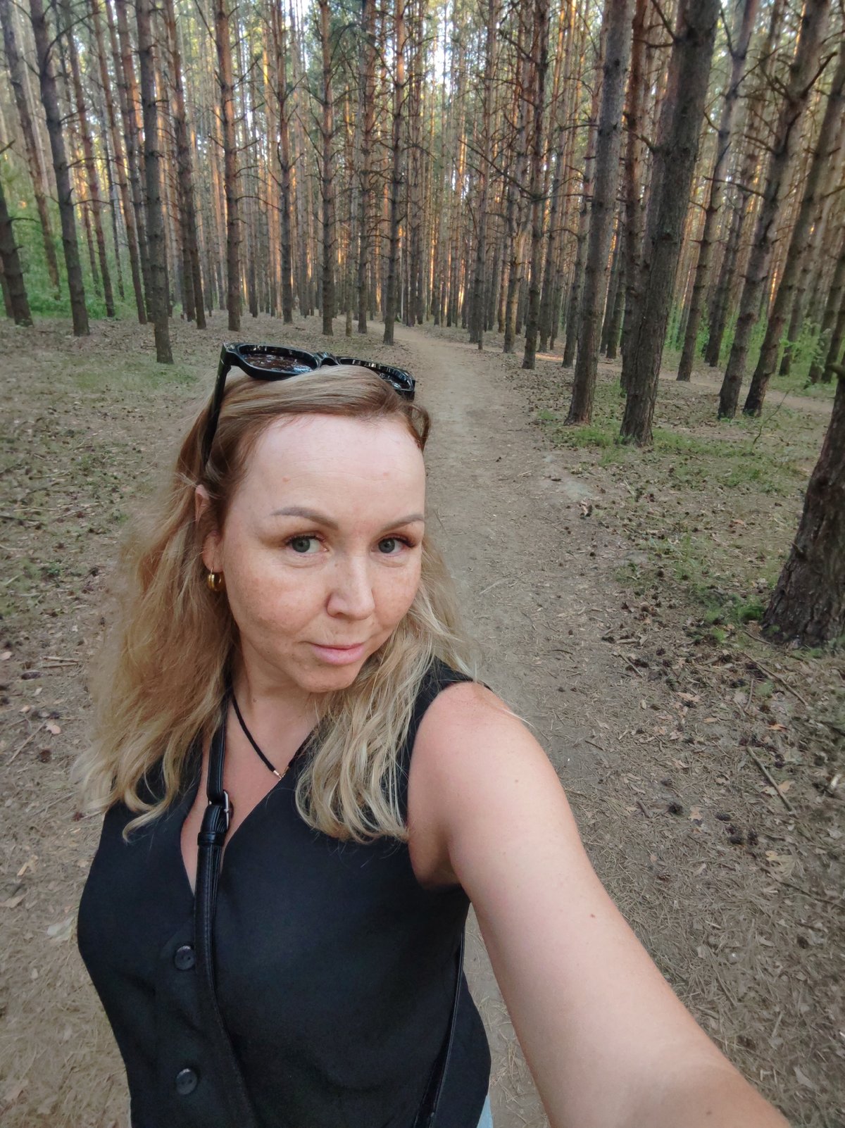Woman documents forest barbecue gathering with cat in Chaikovsky