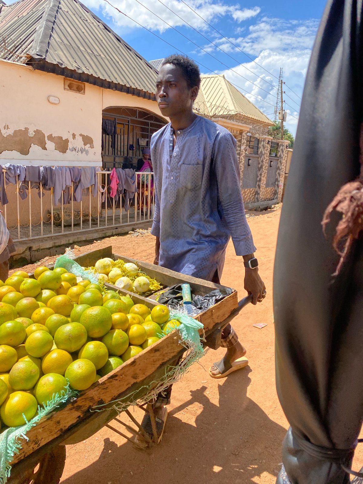 Everyday market life moving through the streets of Bukuru
