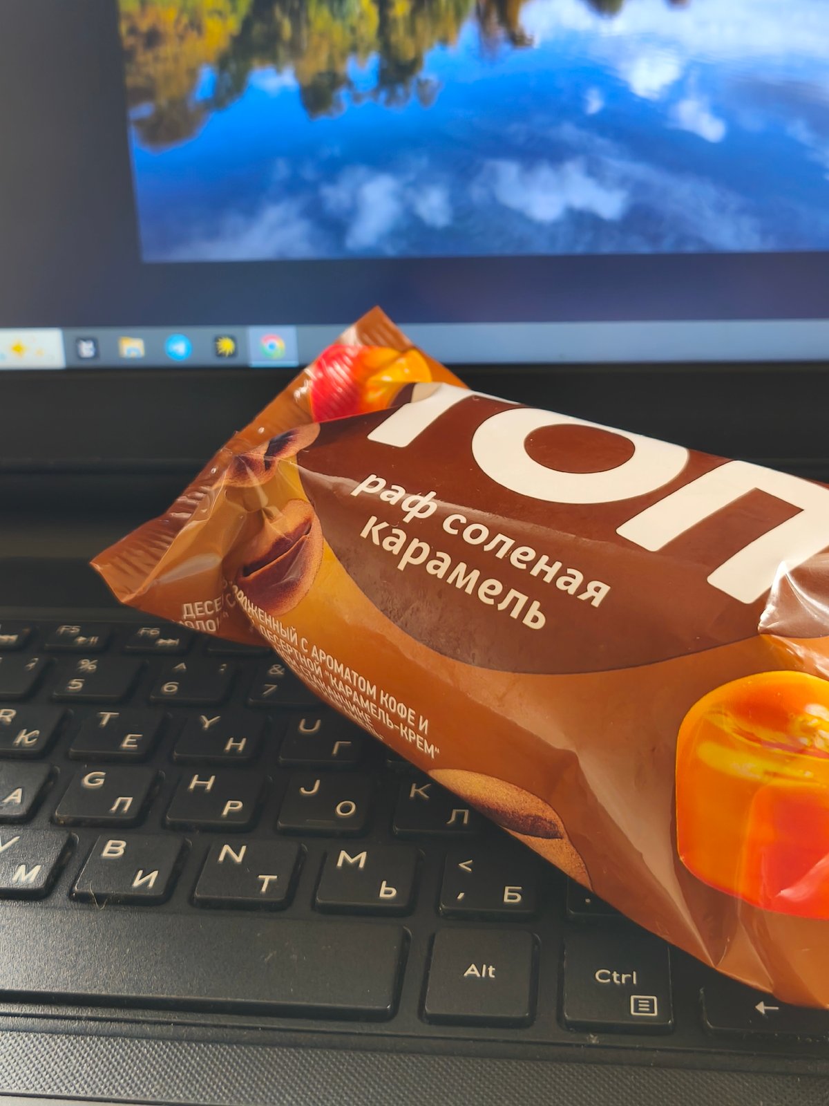 Afternoon snack break documented in Belarus with chocolate and apple