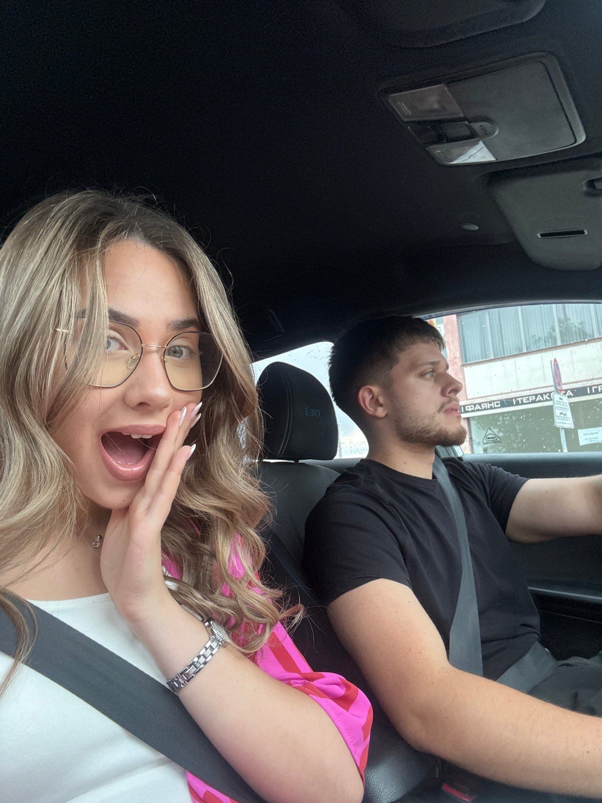Casual in-car moments and street traffic in Blagoevgrad