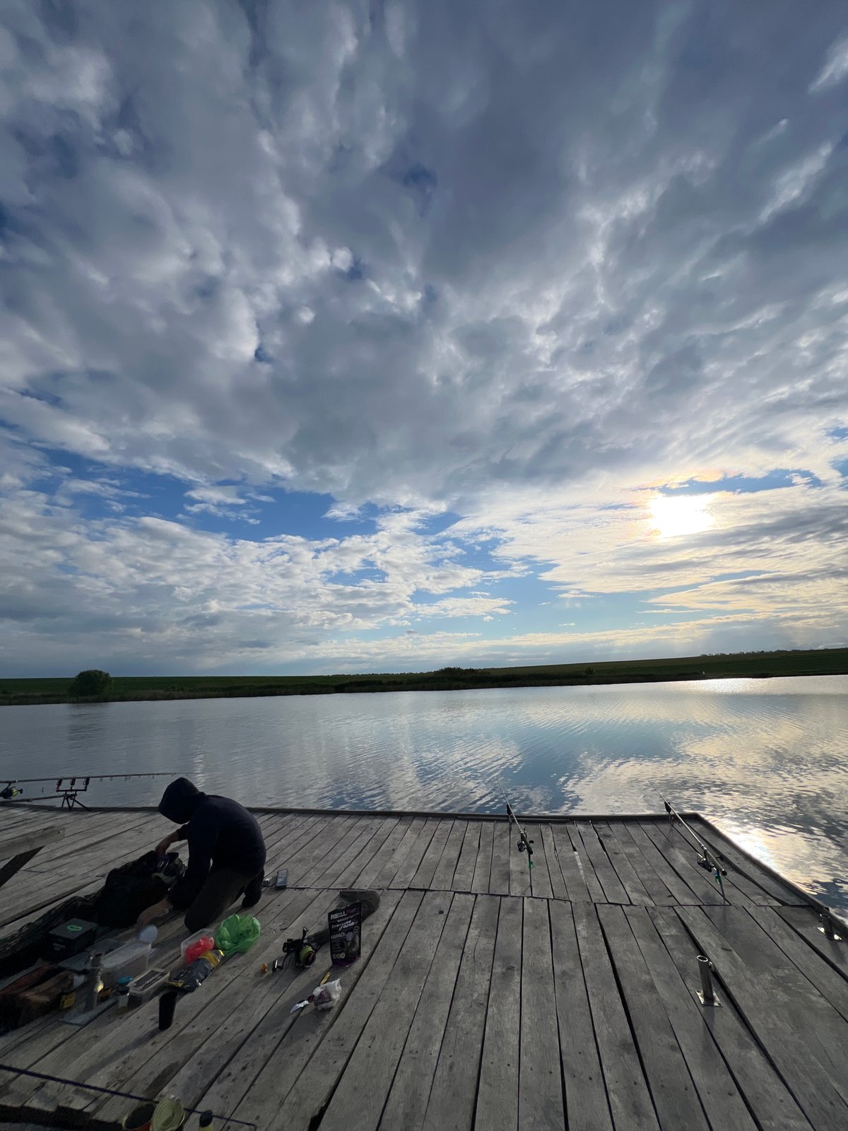 Early morning fishing session observed at Kopychyntsi lake dock