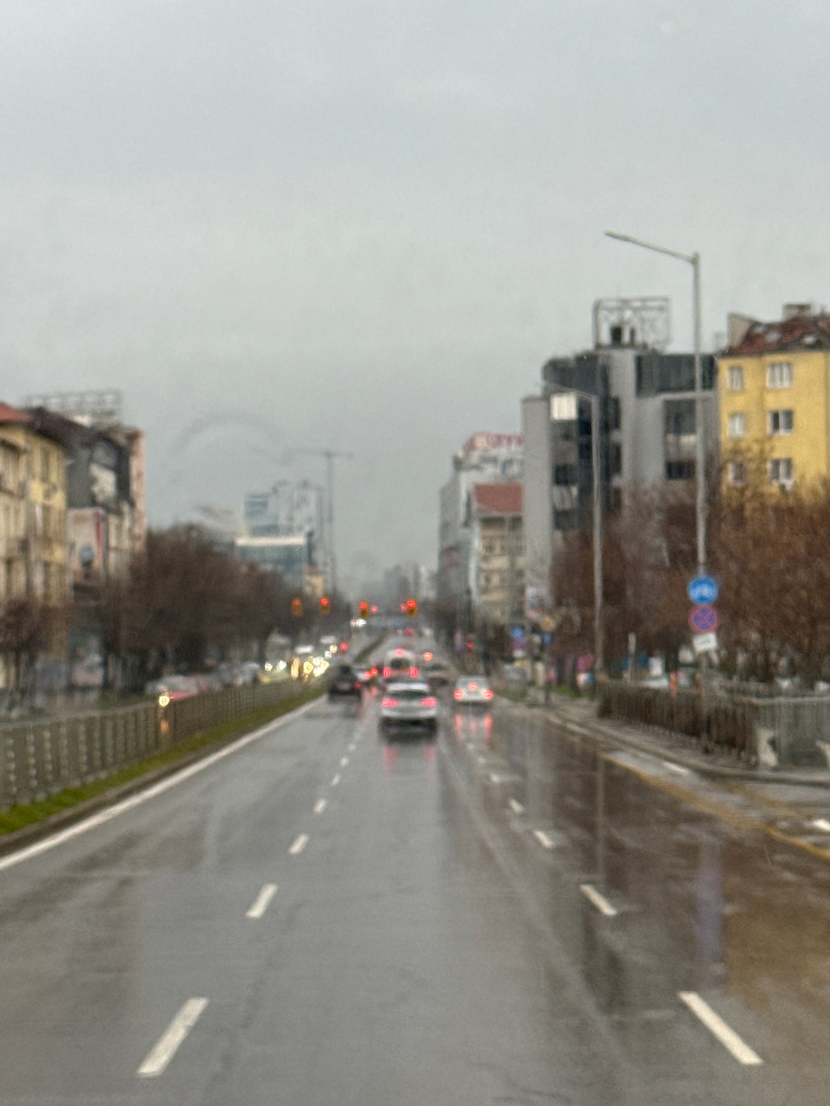 Early morning rain creates wet street scene in Sofia