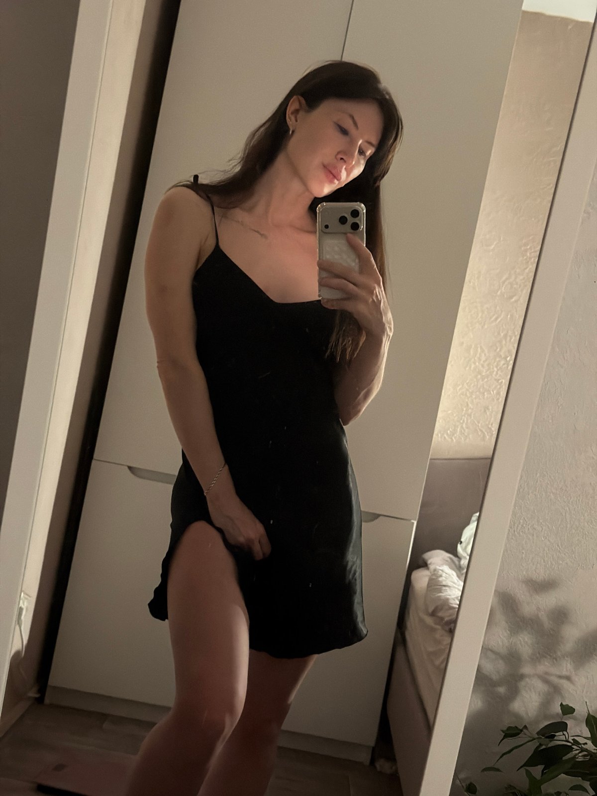 Woman documents evening routine through selfies in Perm residence