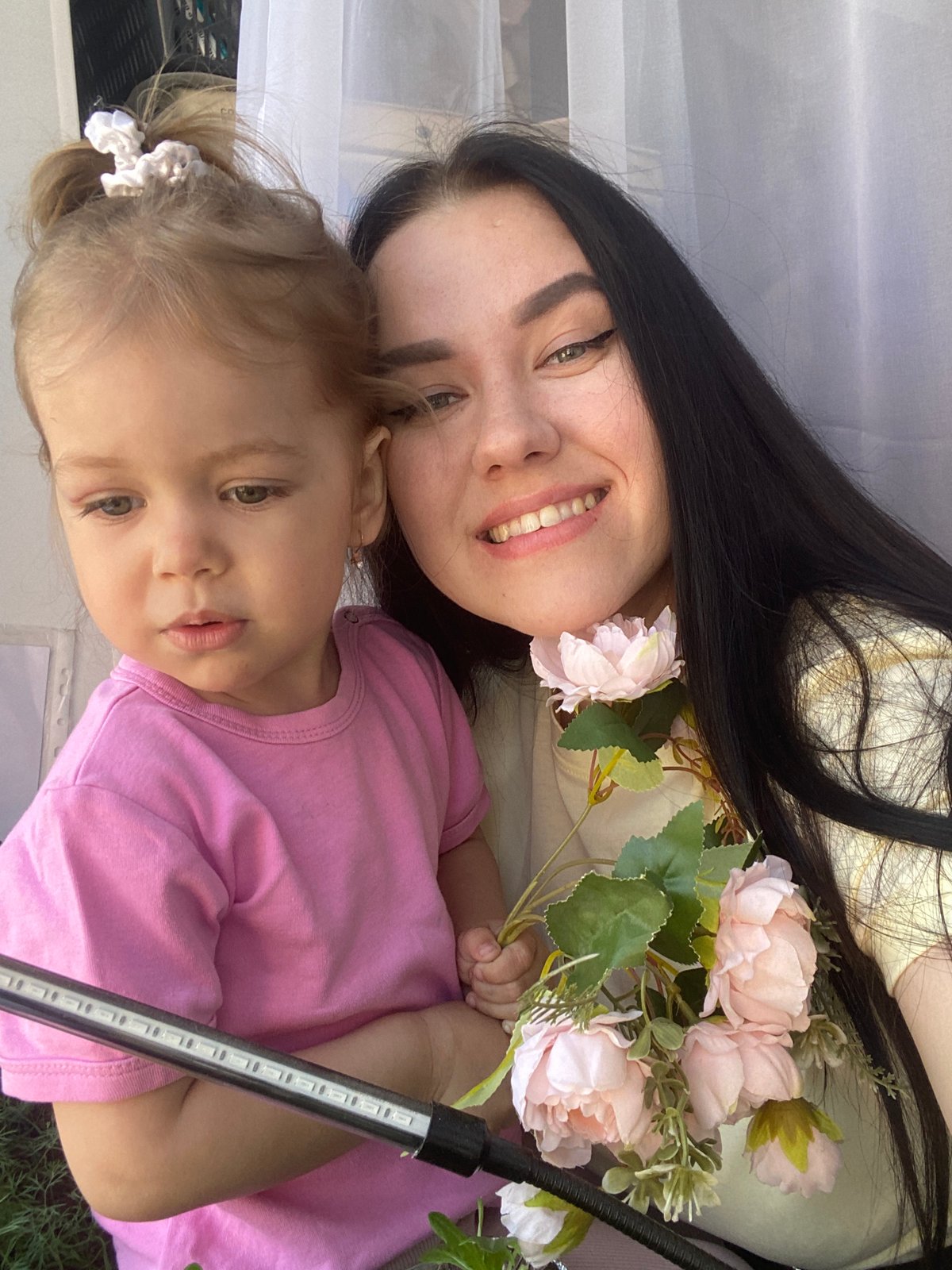 Mother and toddler share quiet morning moments in Chaikovsky