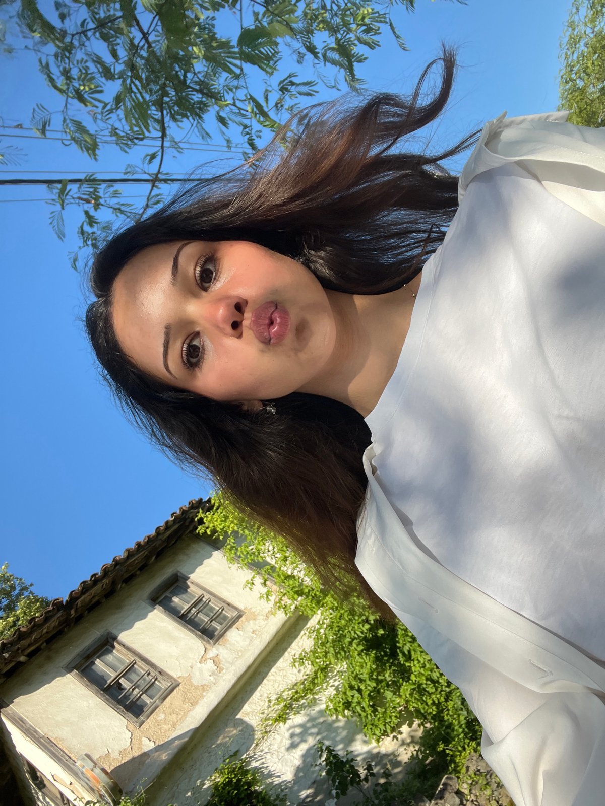 Woman documents morning selfie session in Zlatograd, Bulgaria