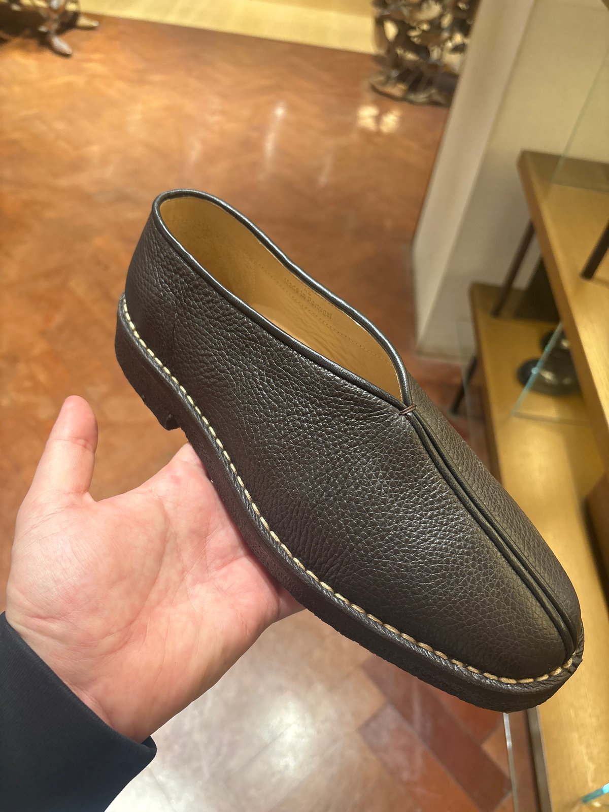 London resident displays leather slipper, Rick and Morty pickles
